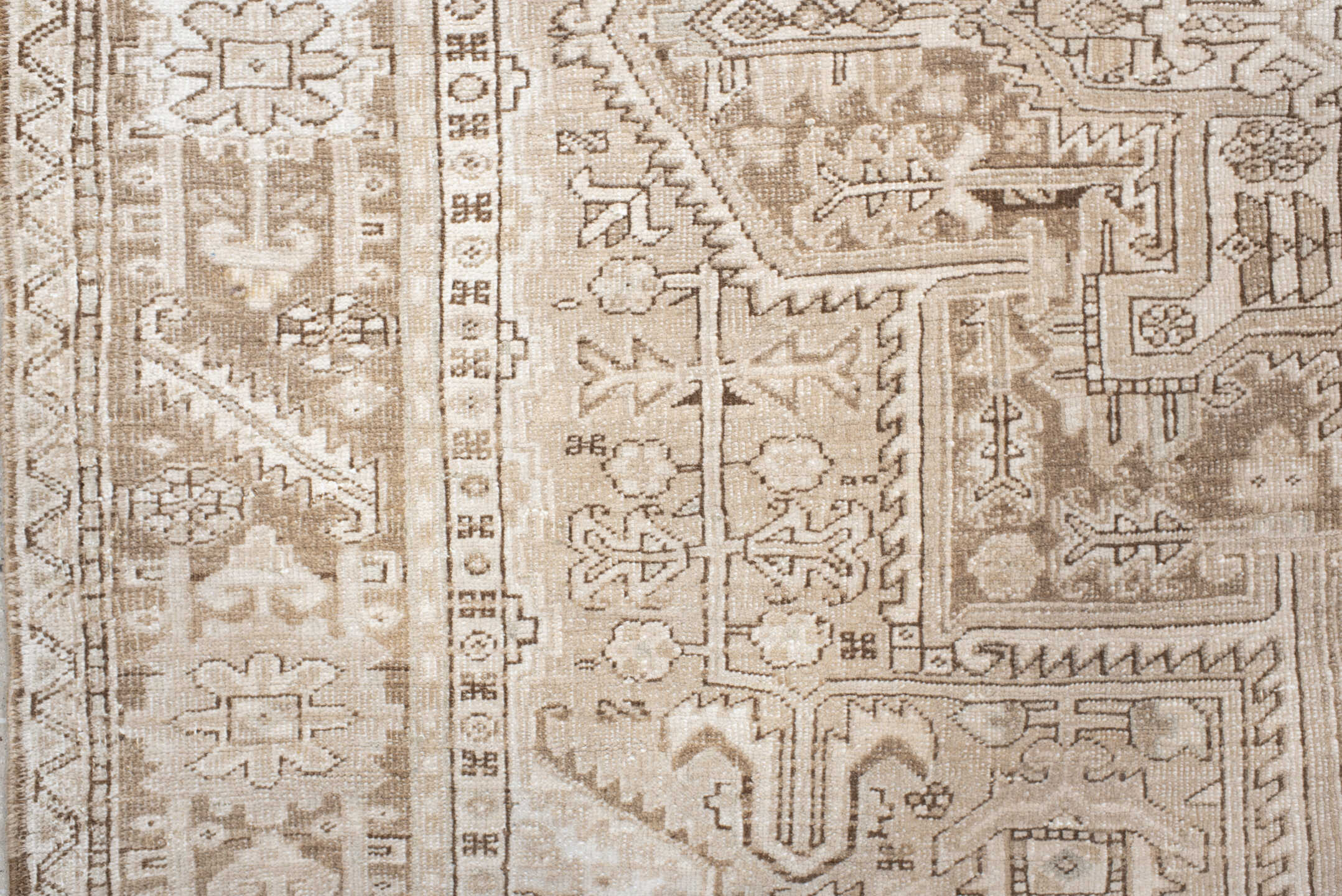 6' x 9' one-of-a-kind handmade antique Heriz medium size rug. Color palette: ivory, taupe, beige, sand, camel, gray