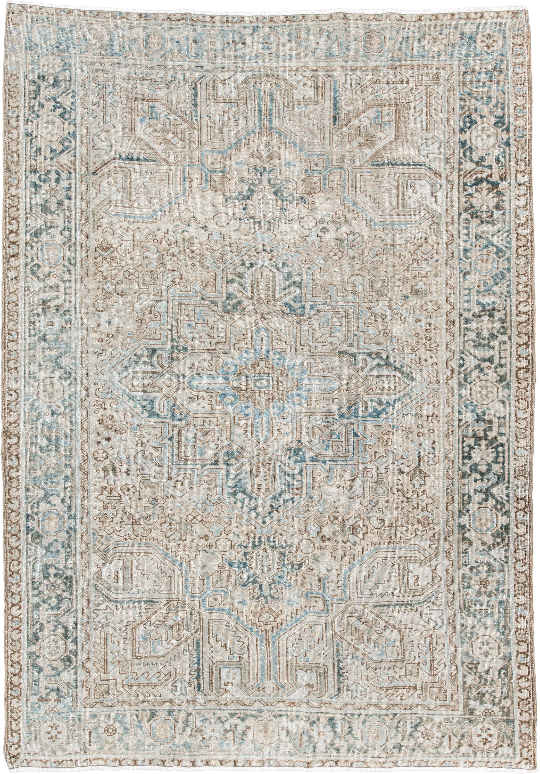 6' x 9' one-of-a-kind handmade antique Heriz medium size rug. Color palette: ivory, sky blue, taupe, beige, slate, camel