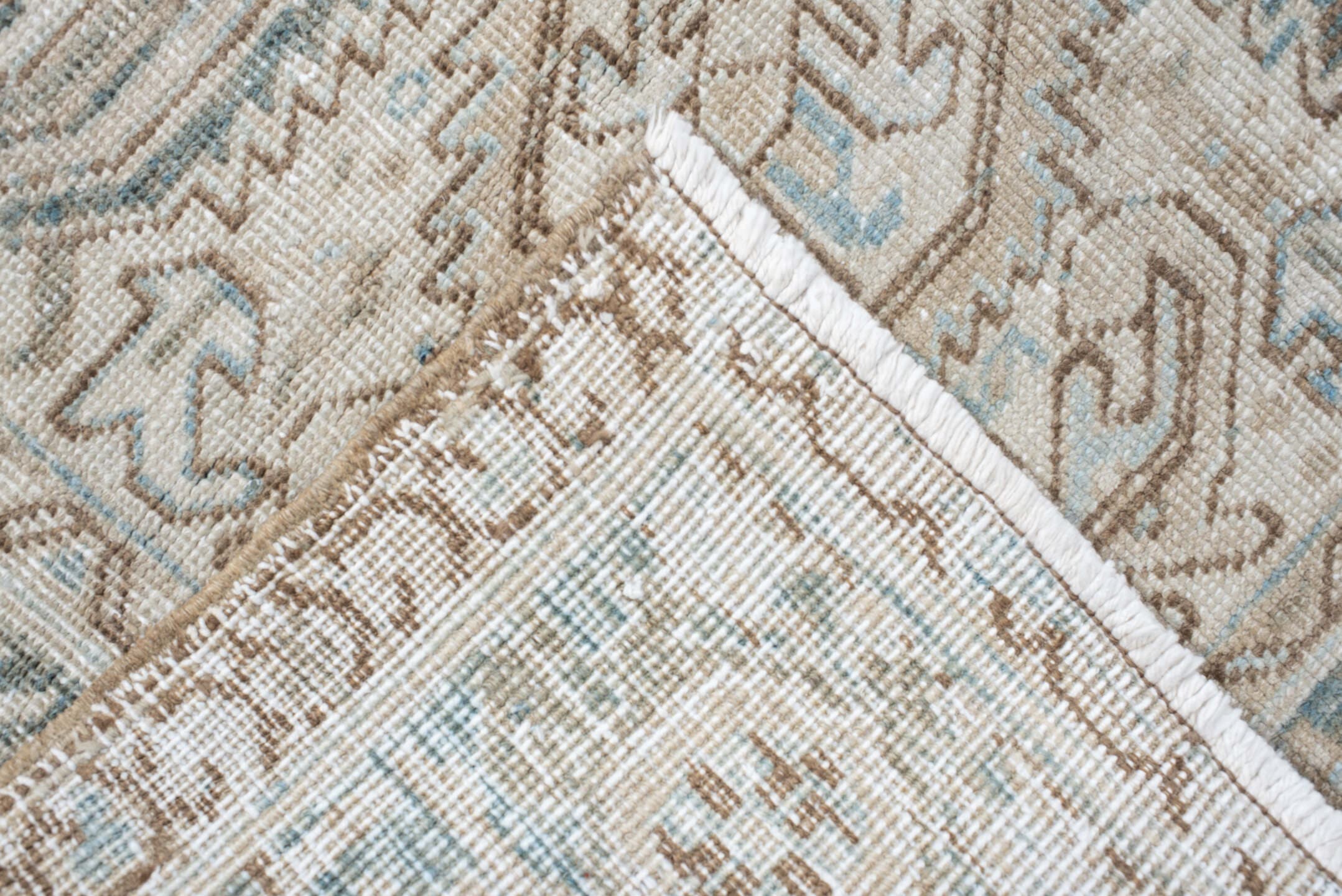6' x 9' one-of-a-kind handmade antique Heriz medium size rug. Color palette: ivory, sky blue, taupe, beige, slate, camel