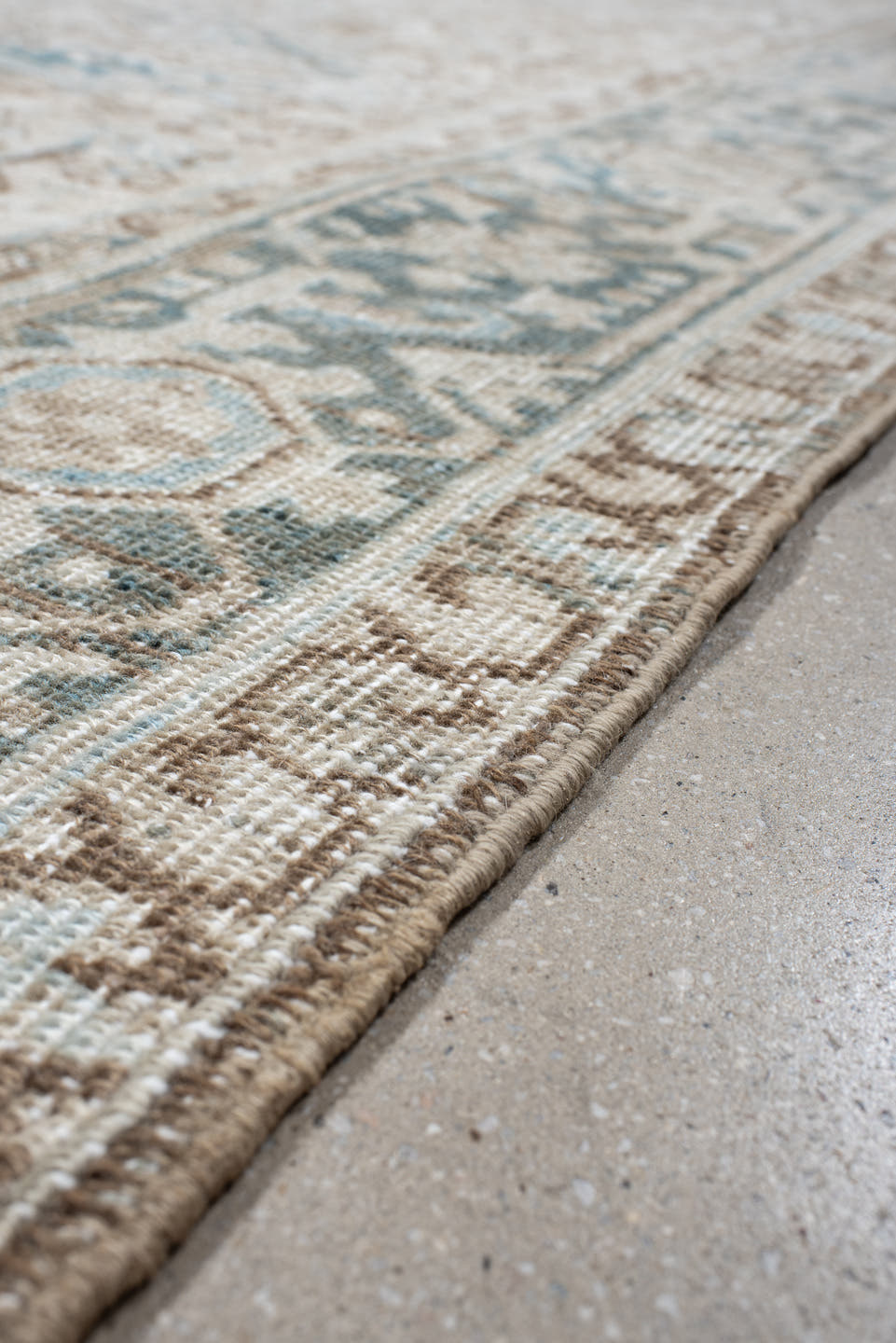 6' x 9' one-of-a-kind handmade antique Heriz medium size rug. Color palette: ivory, sky blue, taupe, beige, slate, camel