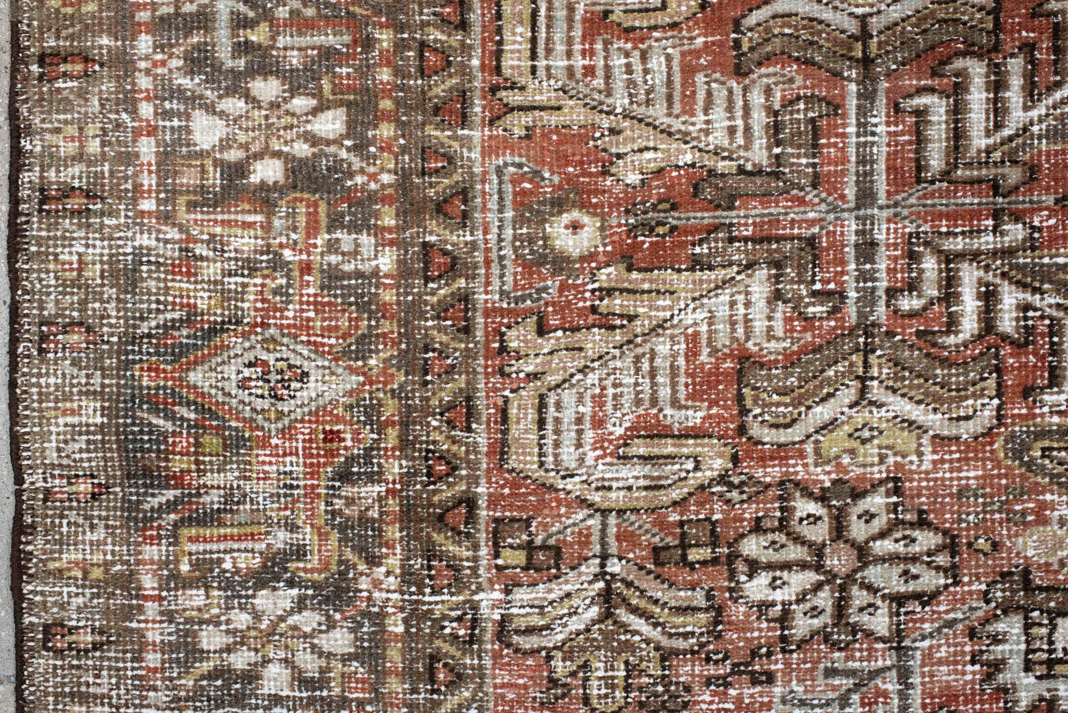 6' x 8' one-of-a-kind handmade antique Heriz medium size rug. Color palette: terra cotta, ivory, taupe, brown, charcoal