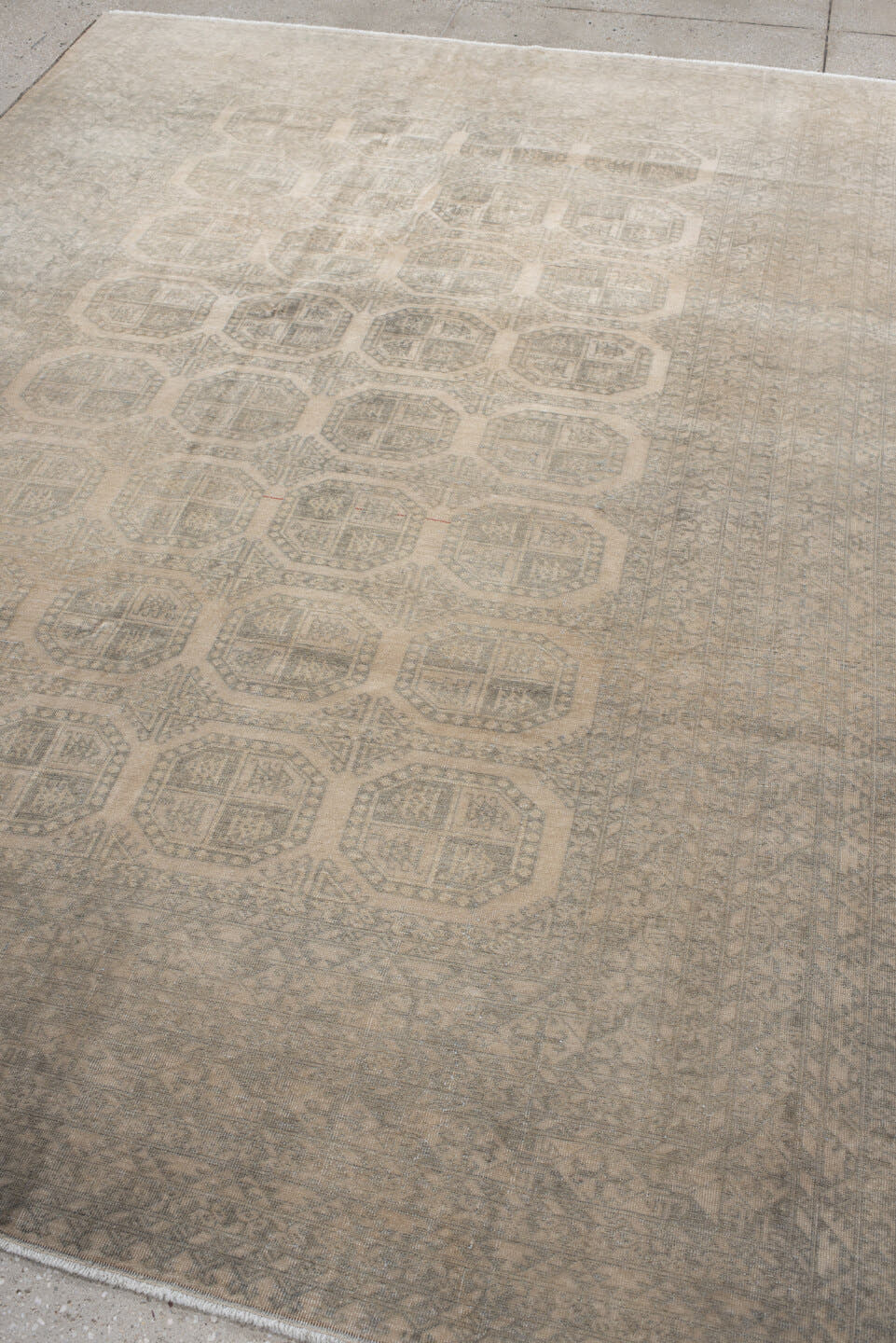 6' x 9' one-of-a-kind handmade antique Afghan medium size rug. Color palette: ivory, taupe, gray, beige, camel