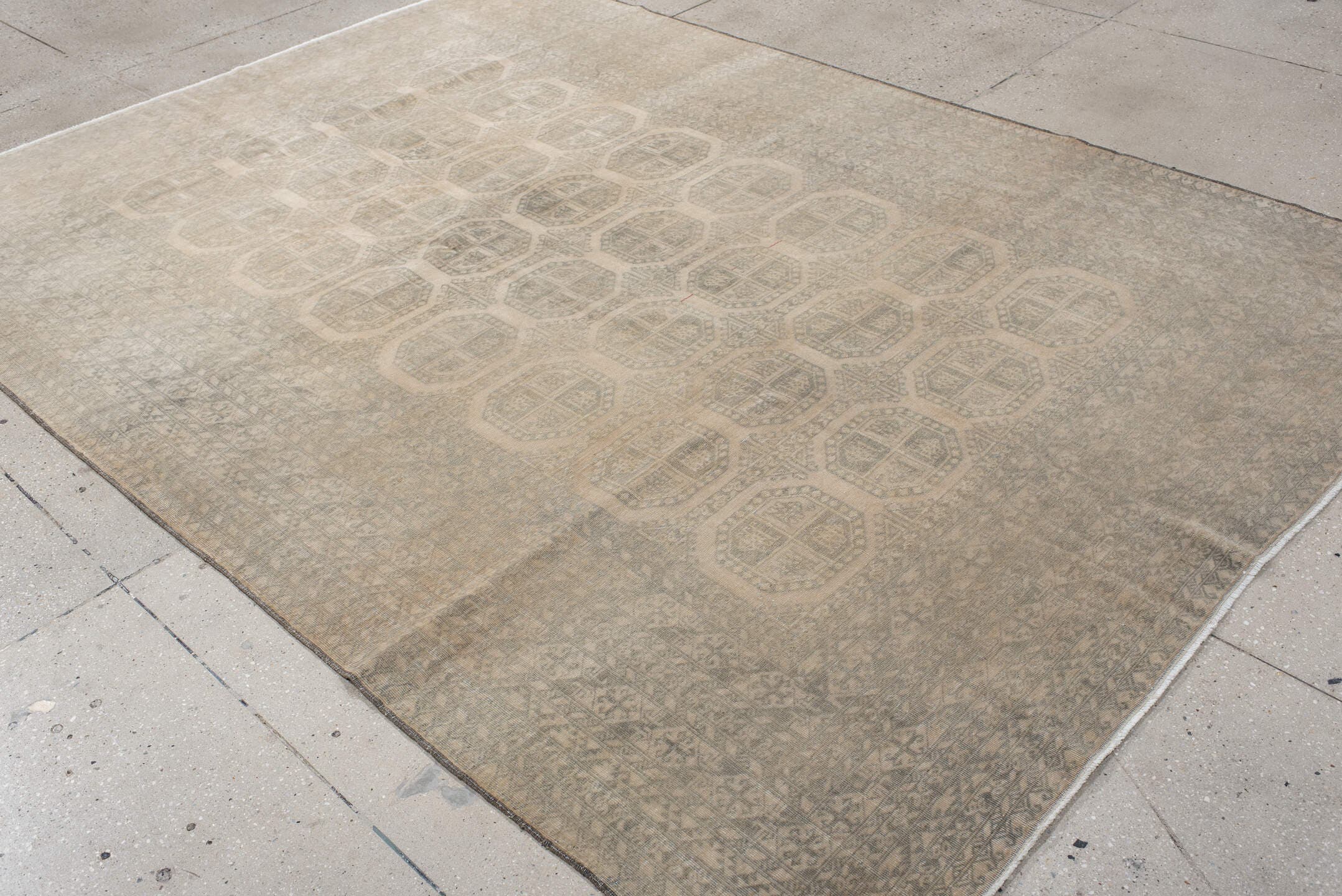 6' x 9' one-of-a-kind handmade antique Afghan medium size rug. Color palette: ivory, taupe, gray, beige, camel