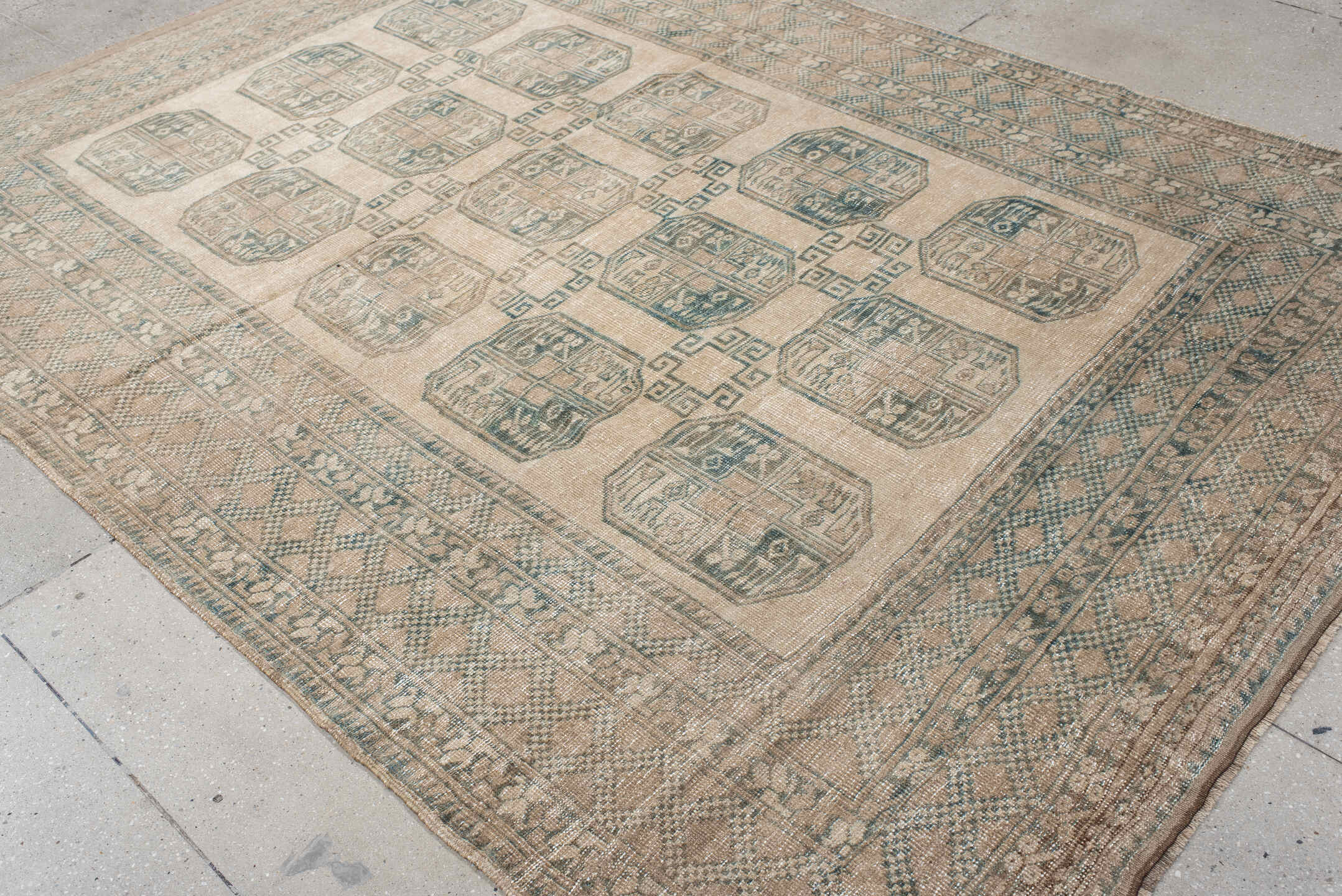 6' x 9' one-of-a-kind handmade antique Afghan medium size rug. Color palette: camel, taupe, sage, ivory, olive, beige, gray