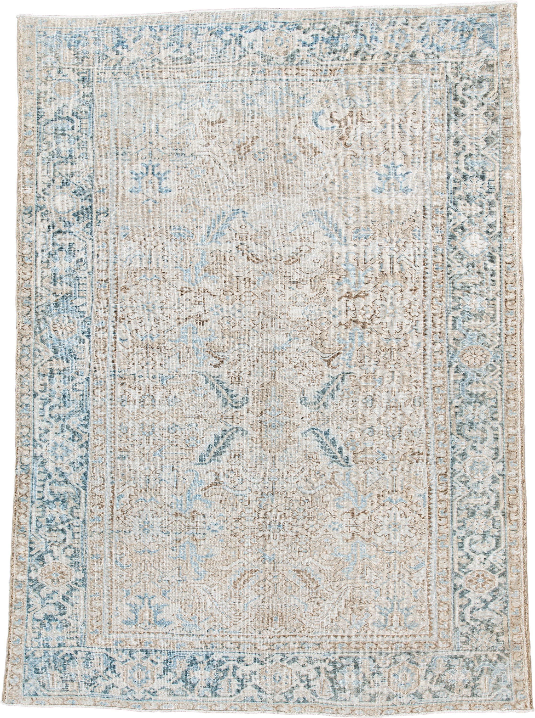 7' x 10' one-of-a-kind handmade antique Heriz large size rug. Color palette: ivory, light blue, taupe, beige, cream, gray