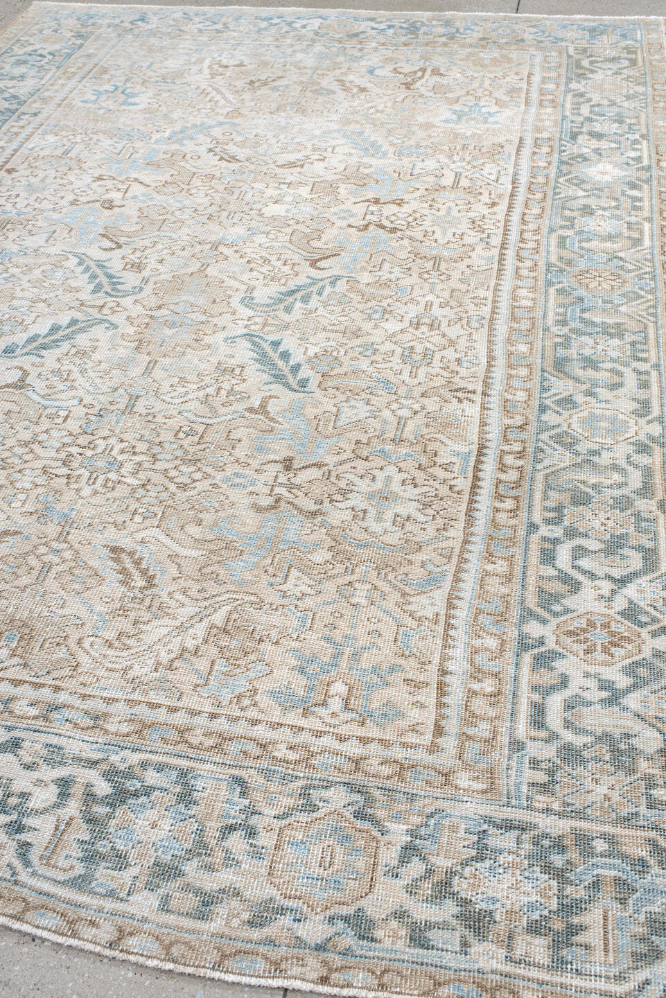 7' x 10' one-of-a-kind handmade antique Heriz large size rug. Color palette: ivory, light blue, taupe, beige, cream, gray