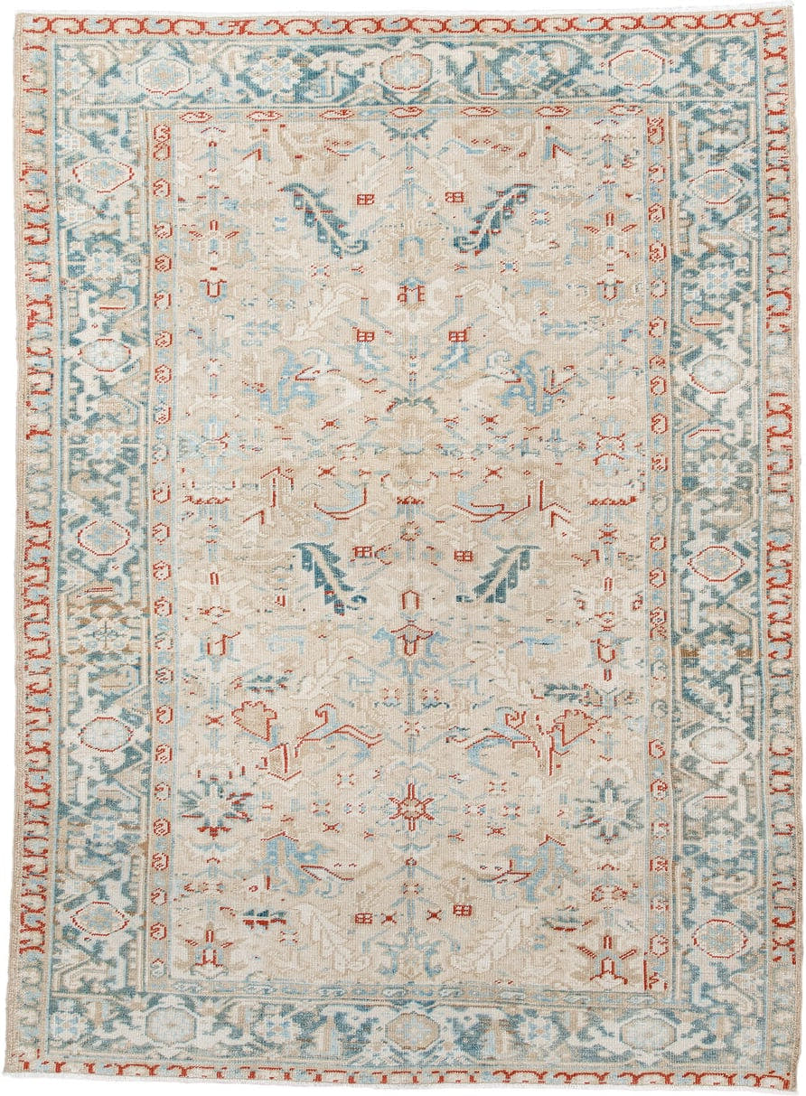 6' x 8' one-of-a-kind handmade antique Heriz medium size rug. Color palette: ivory, pale blue, rust, beige, sky blue