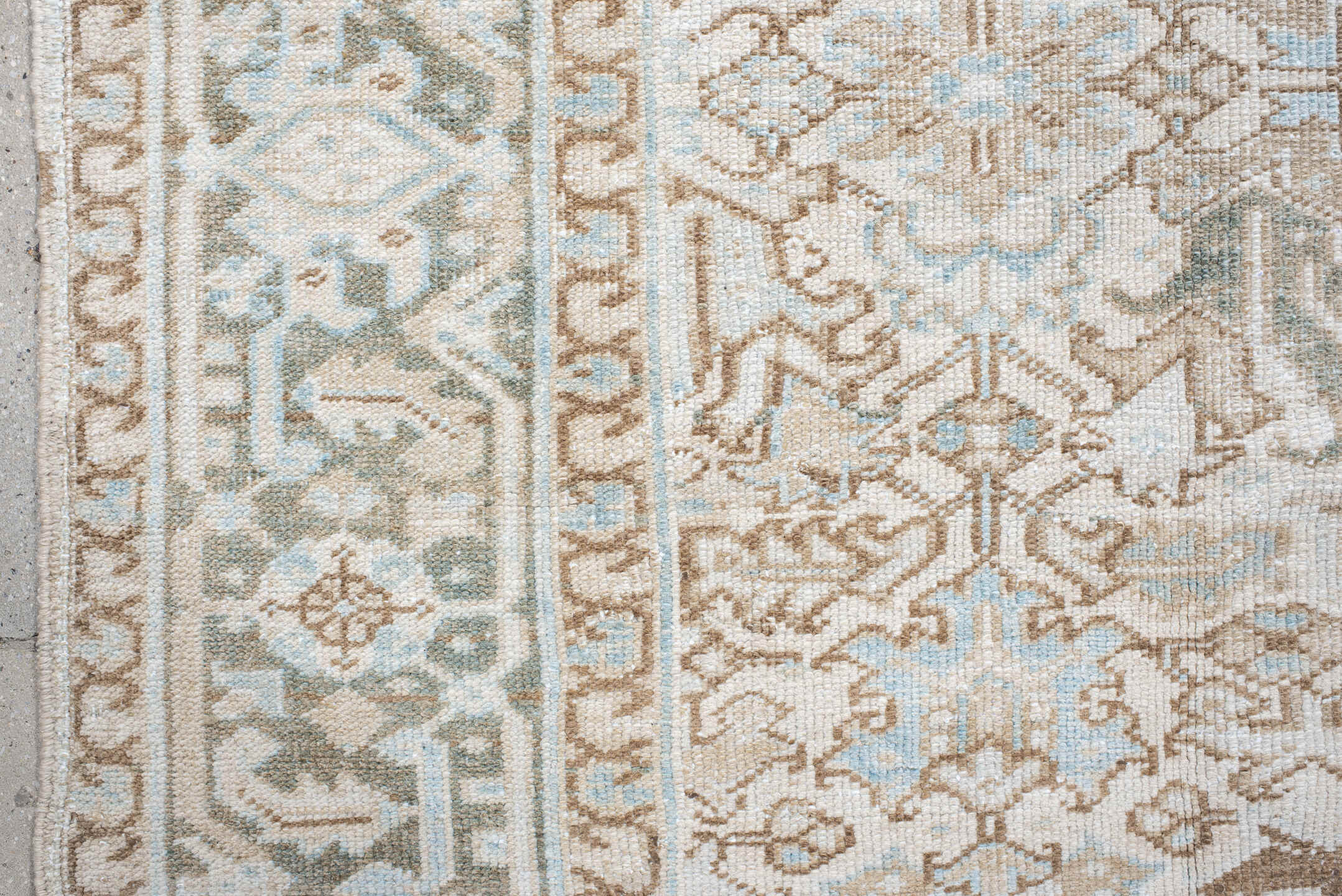 7' x 11' one-of-a-kind handmade antique Heriz large size rug. Color palette: ivory, pale aqua, camel, taupe, sage, cream