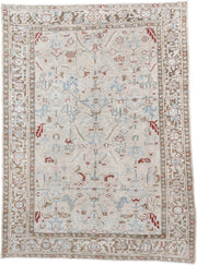 6' x 8' one-of-a-kind handmade antique Heriz medium size rug. Color palette: ivory, taupe, light blue, rust, beige, gray