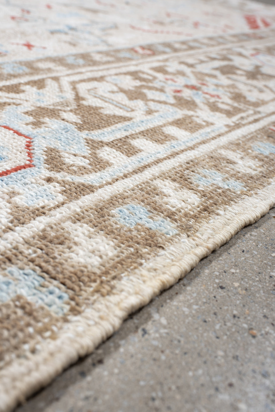 6' x 8' one-of-a-kind handmade antique Heriz medium size rug. Color palette: ivory, taupe, light blue, rust, beige, gray