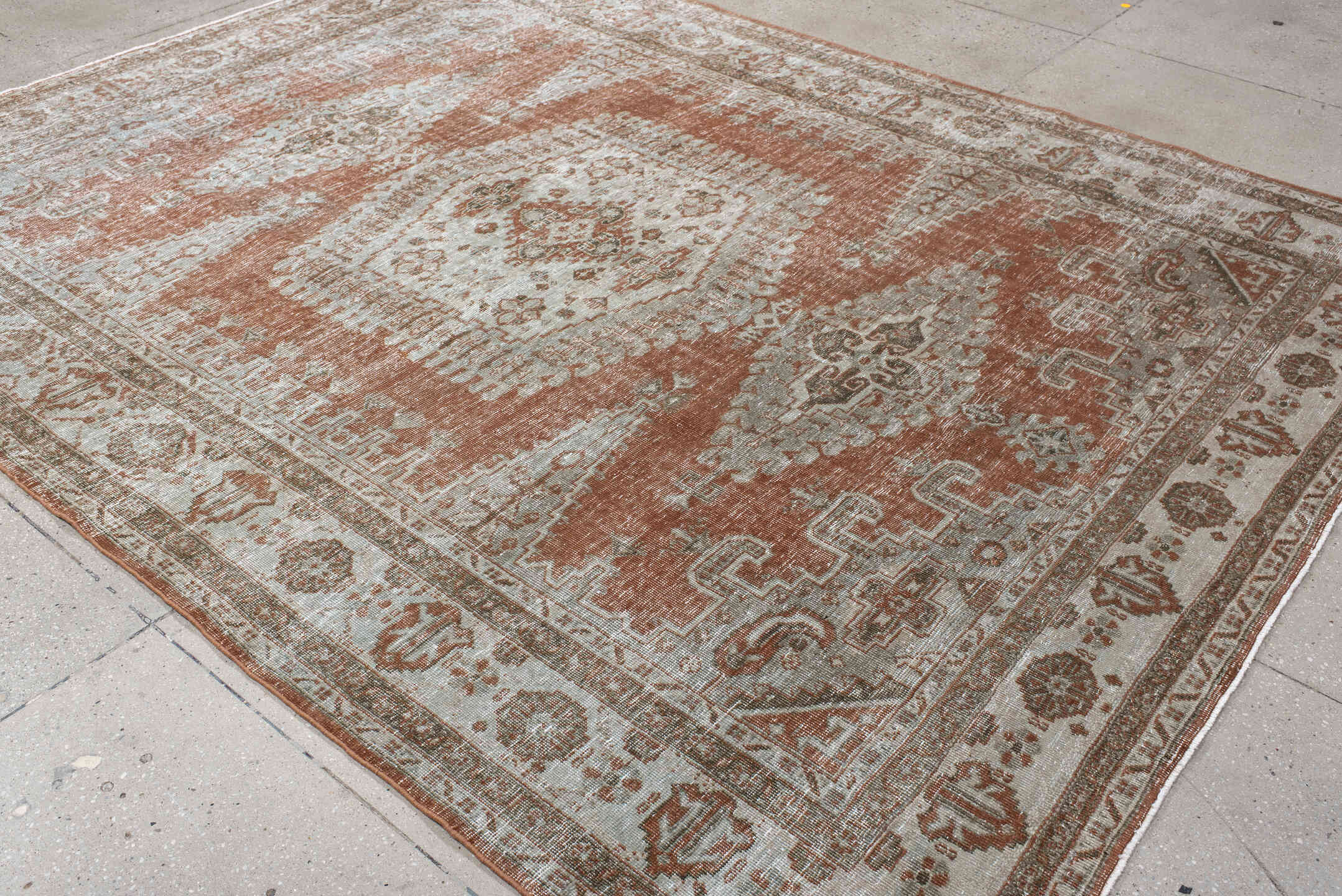 7' x 9' one-of-a-kind handmade antique Veece large size rug. Color palette: terra cotta, ivory, taupe, camel, sage, charcoal