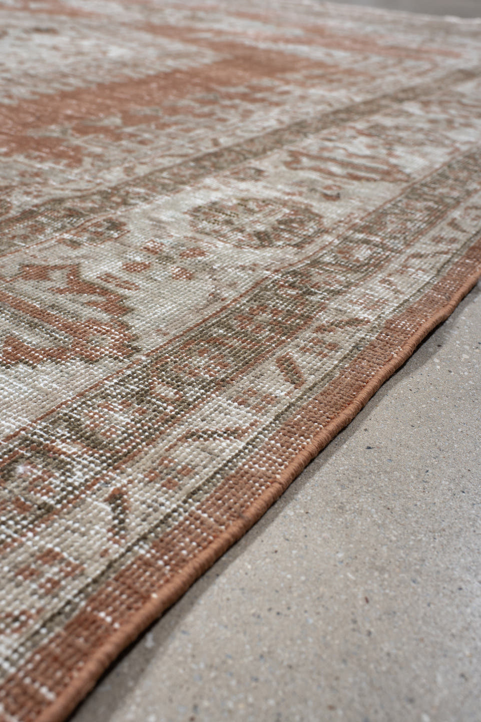 7' x 9' one-of-a-kind handmade antique Veece large size rug. Color palette: terra cotta, ivory, taupe, camel, sage, charcoal