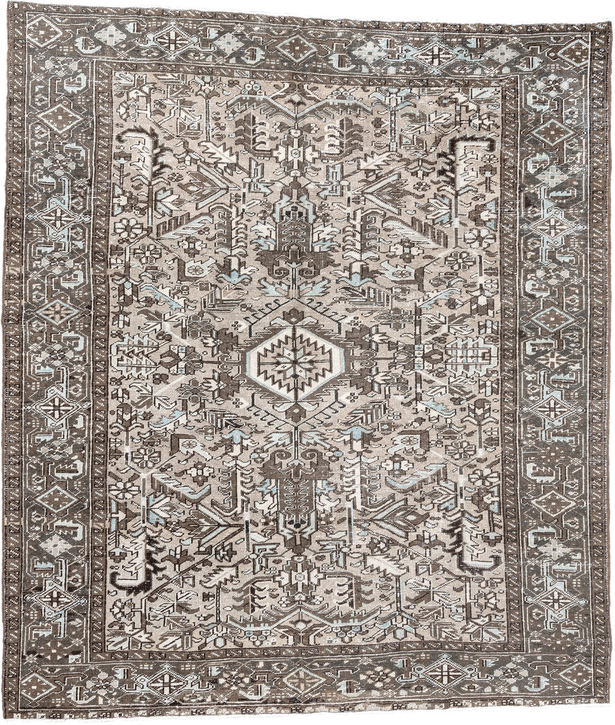8' x 9' one-of-a-kind handmade antique Heriz rug. Color palette: taupe, ivory, brown, camel, pale blue, charcoal, beige