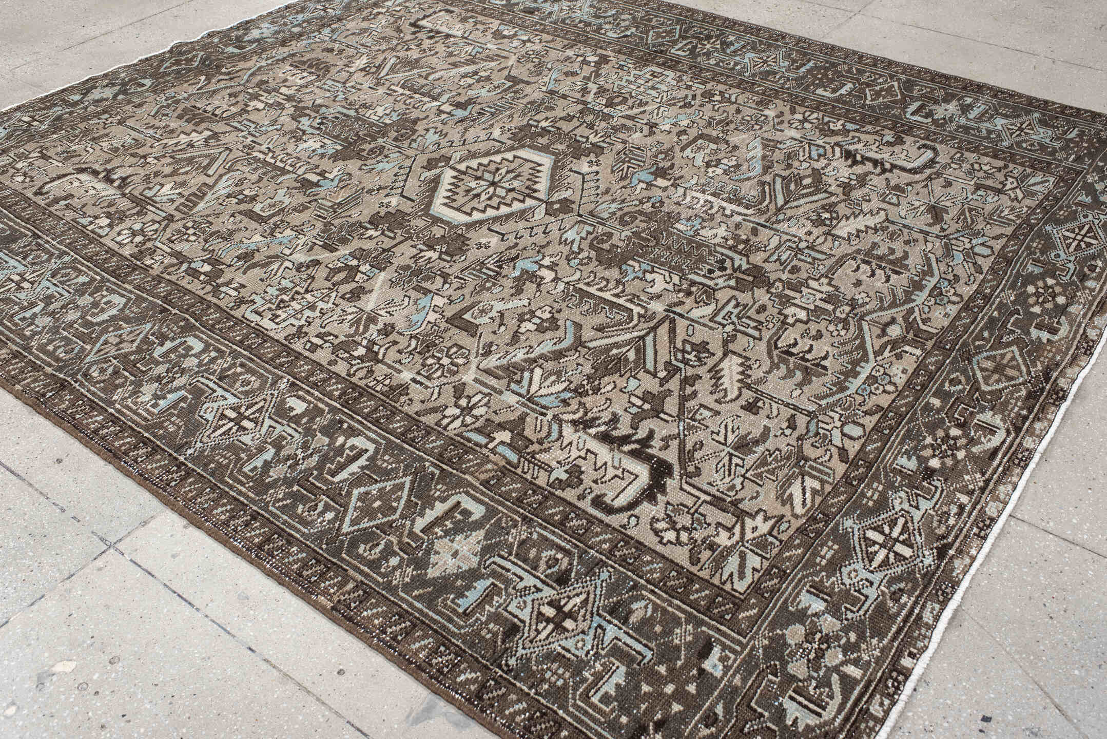 8' x 9' one-of-a-kind handmade vintage Heriz rug. Color palette: black, brown, charcoal, dark gray, gray, light gray, linen