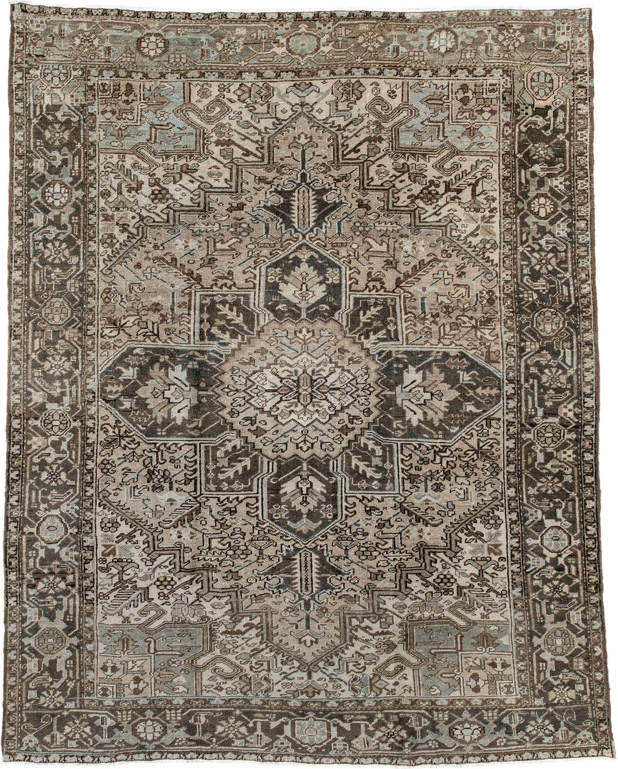7' x 9' one-of-a-kind handmade antique Heriz large size rug. Color palette: taupe, charcoal, ivory, camel, slate, brown