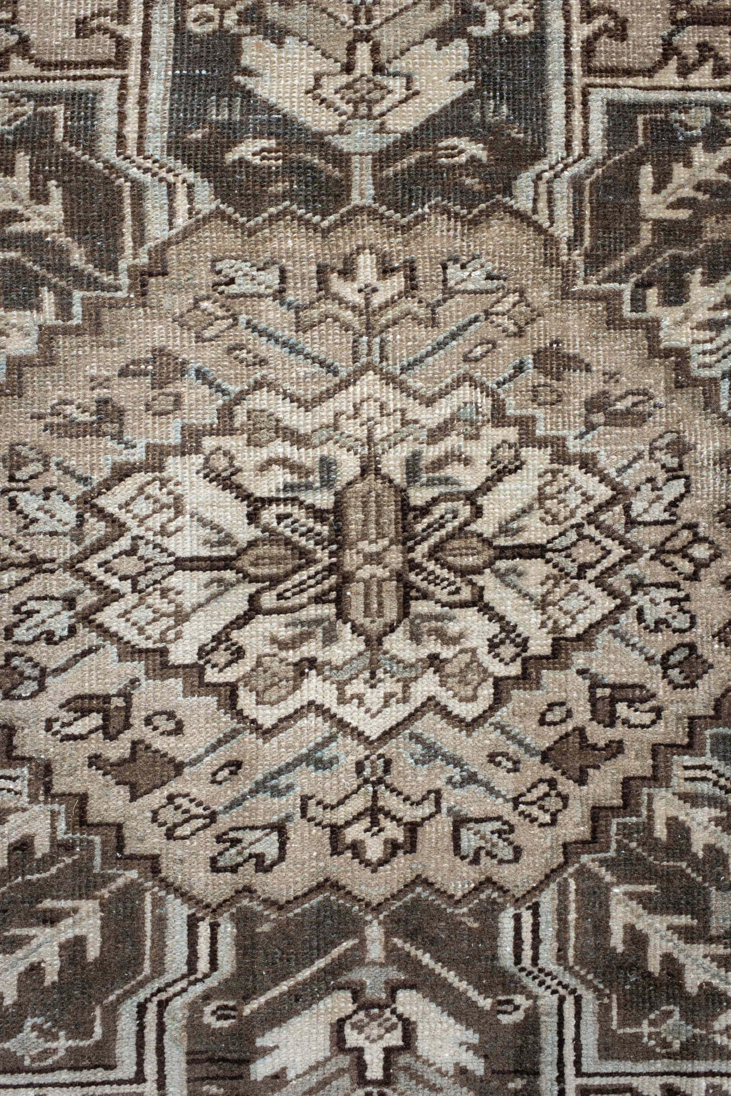 7' x 9' one-of-a-kind handmade antique Heriz large size rug. Color palette: taupe, charcoal, ivory, camel, slate, brown