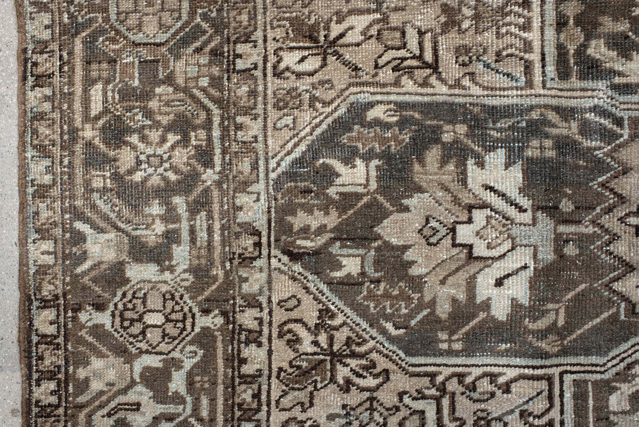7' x 9' one-of-a-kind handmade antique Heriz large size rug. Color palette: taupe, charcoal, ivory, camel, slate, brown
