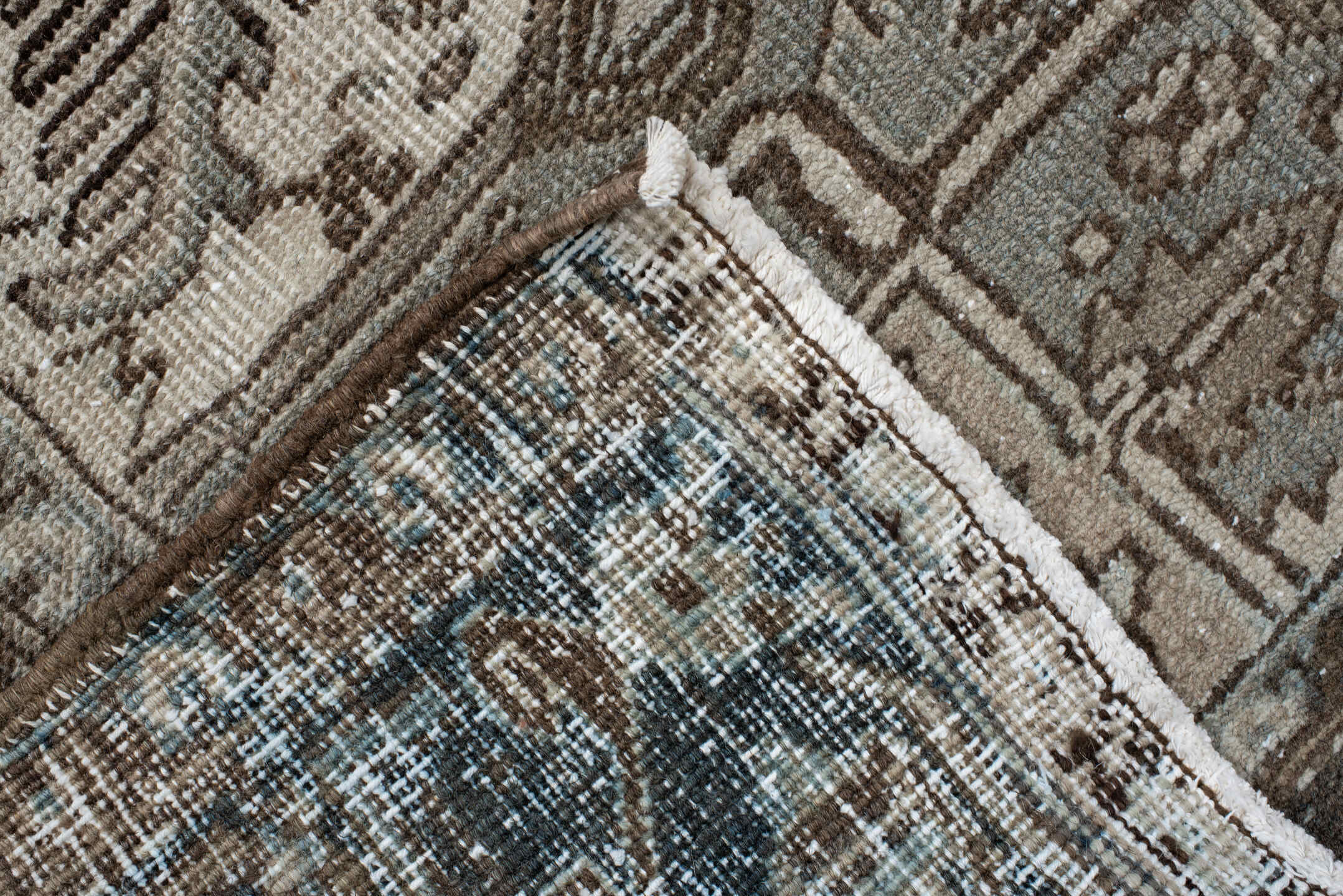 7' x 9' one-of-a-kind handmade antique Heriz large size rug. Color palette: taupe, charcoal, ivory, camel, slate, brown