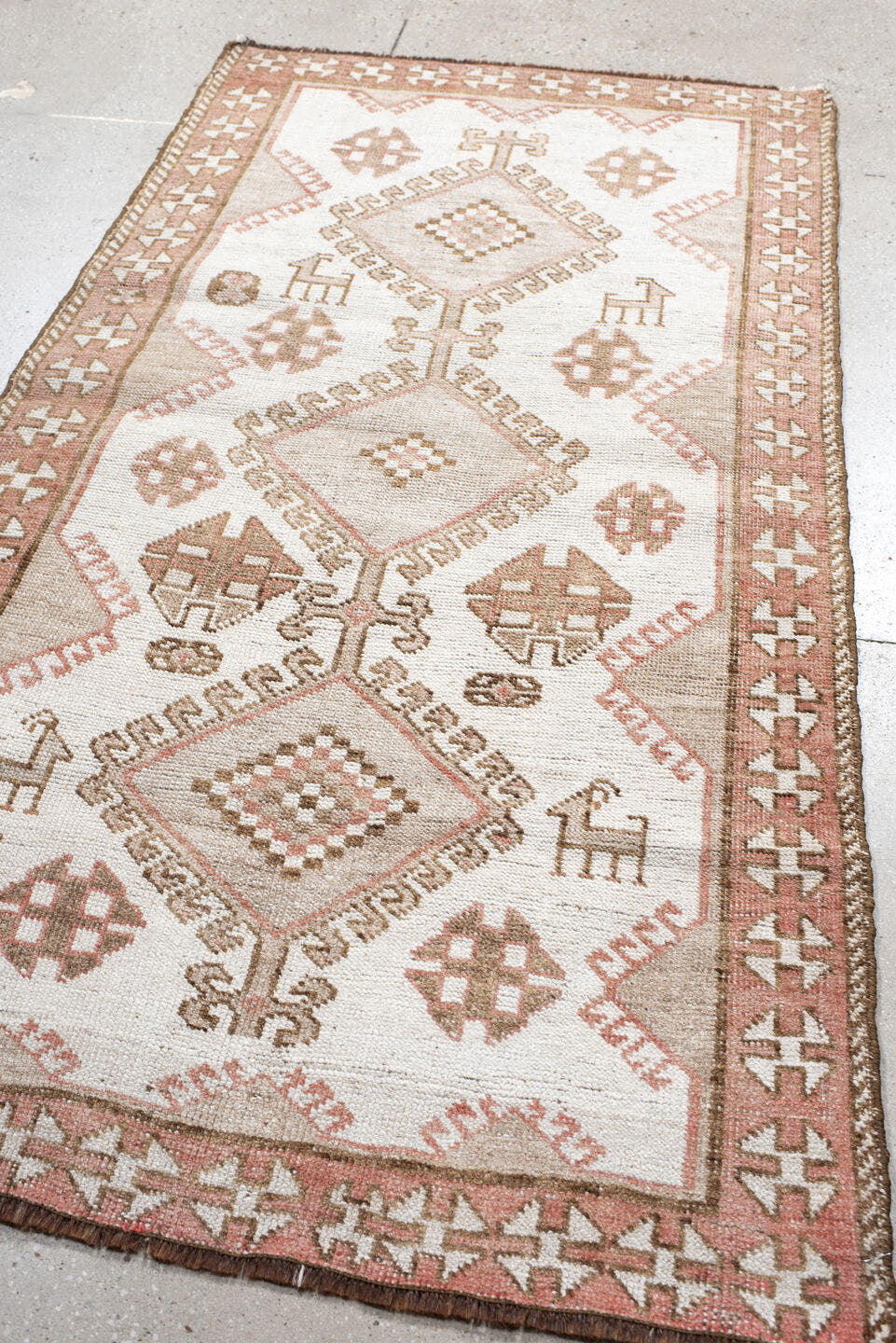 3' x 6' one-of-a-kind handmade antique Gabbe small size rug. Color palette: ivory, blush, taupe, camel, brown, pink, beige