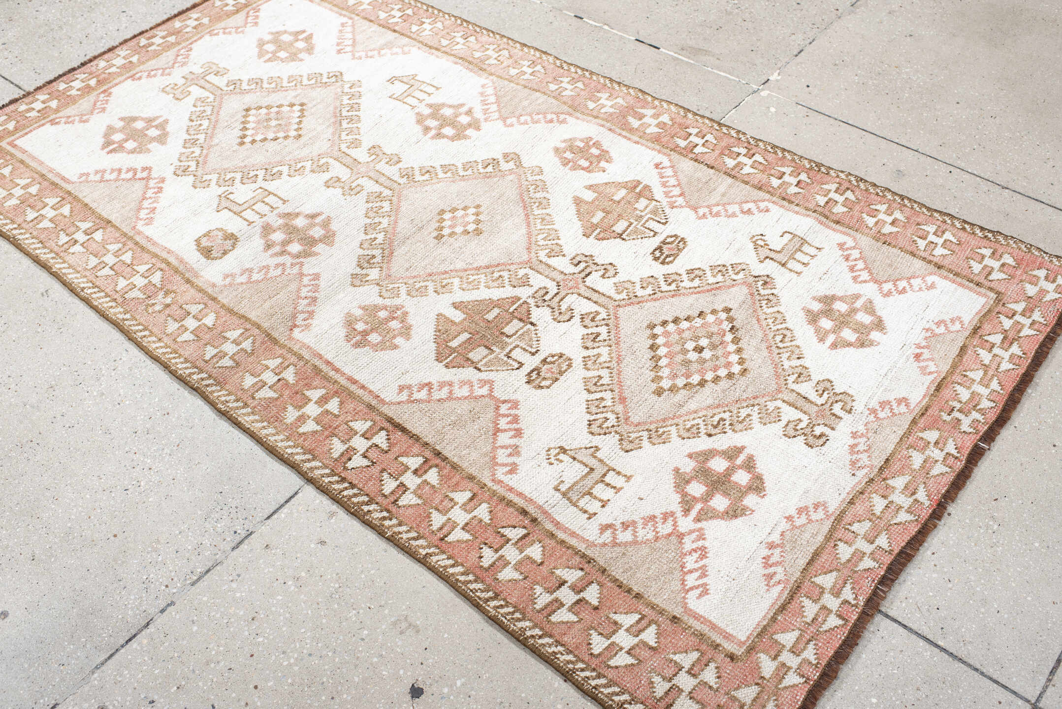 3' x 6' one-of-a-kind handmade antique Gabbe small size rug. Color palette: ivory, blush, taupe, camel, brown, pink, beige