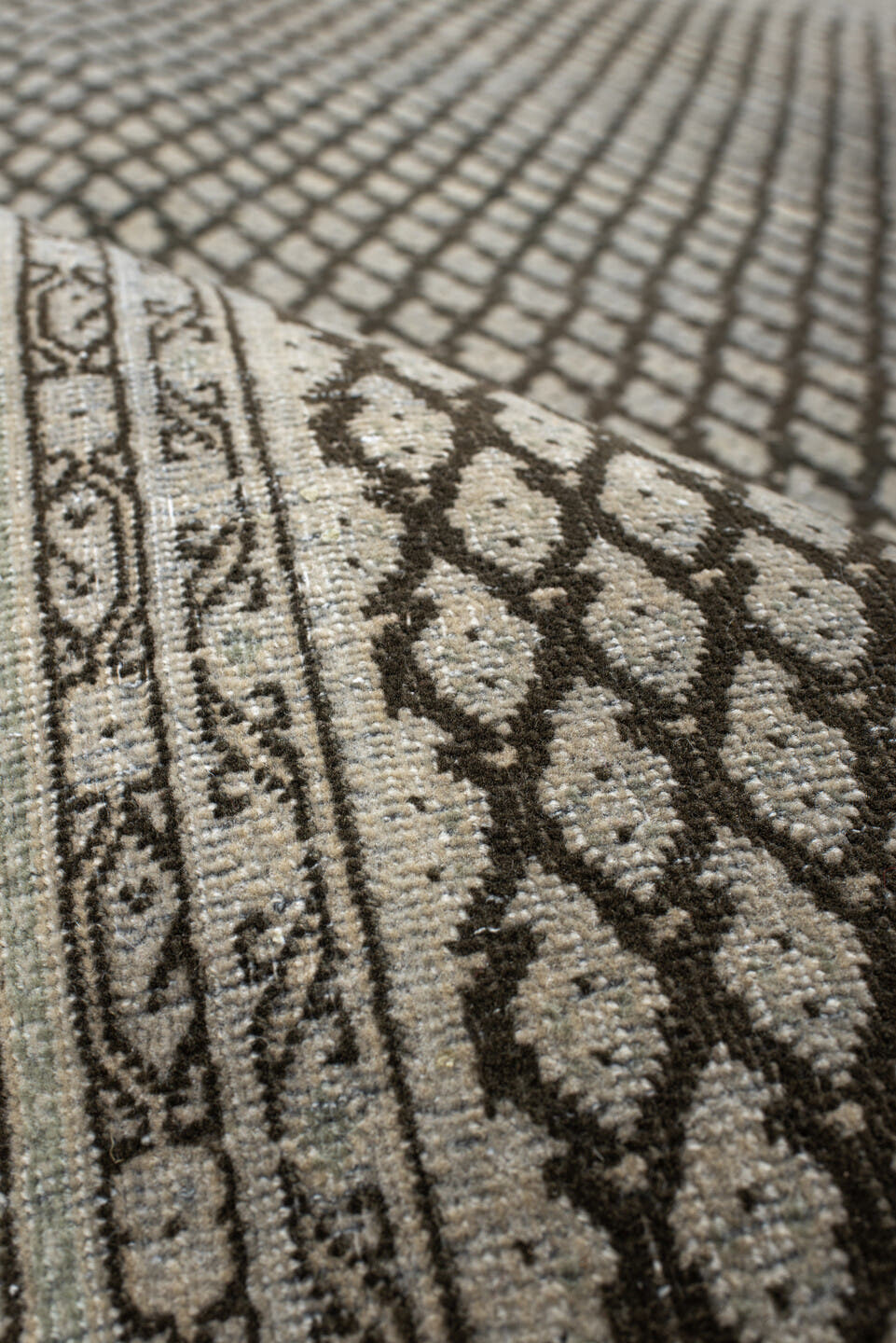 6' x 7' one-of-a-kind handmade antique Mir rug. Color palette: ivory, brown, taupe, camel, charcoal, beige, gray, black