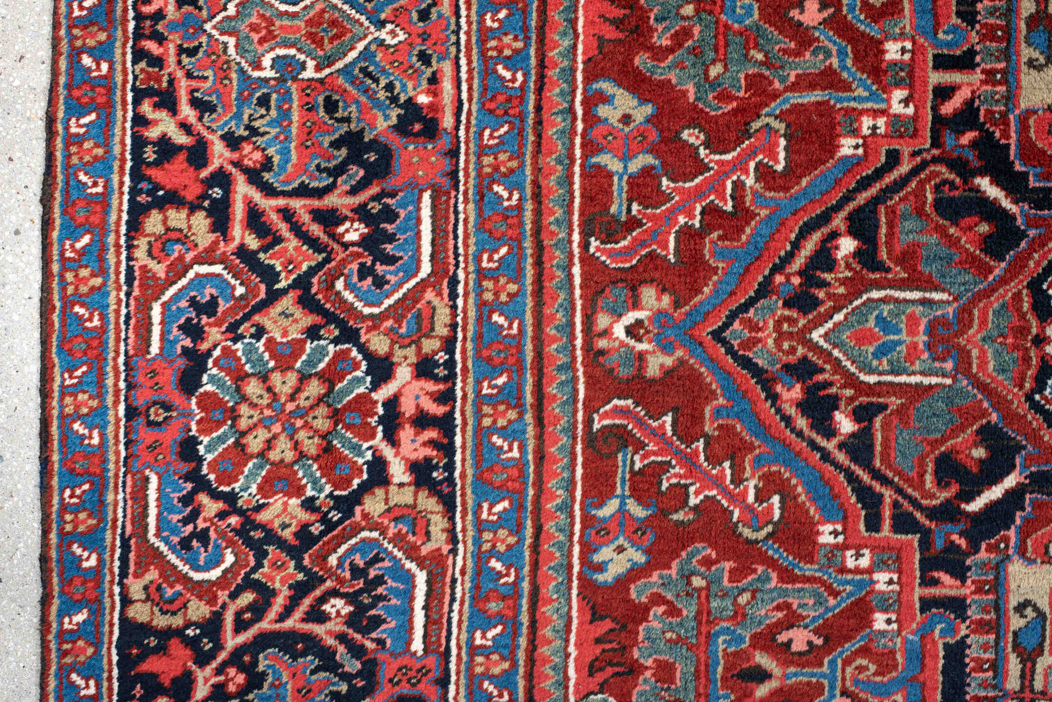 8' x 11' one-of-a-kind handmade antique Heriz large size rug. Color palette: rust, navy, ivory, sky_blue, brick, coral