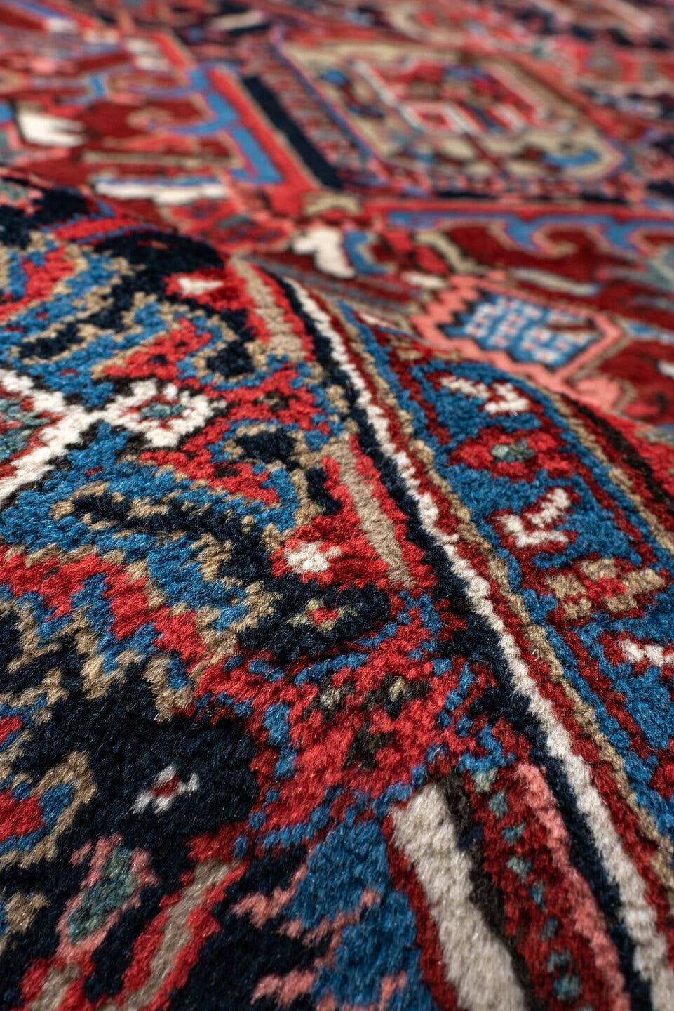 8' x 11' one-of-a-kind handmade antique Heriz large size rug. Color palette: rust, navy, ivory, sky_blue, brick, coral