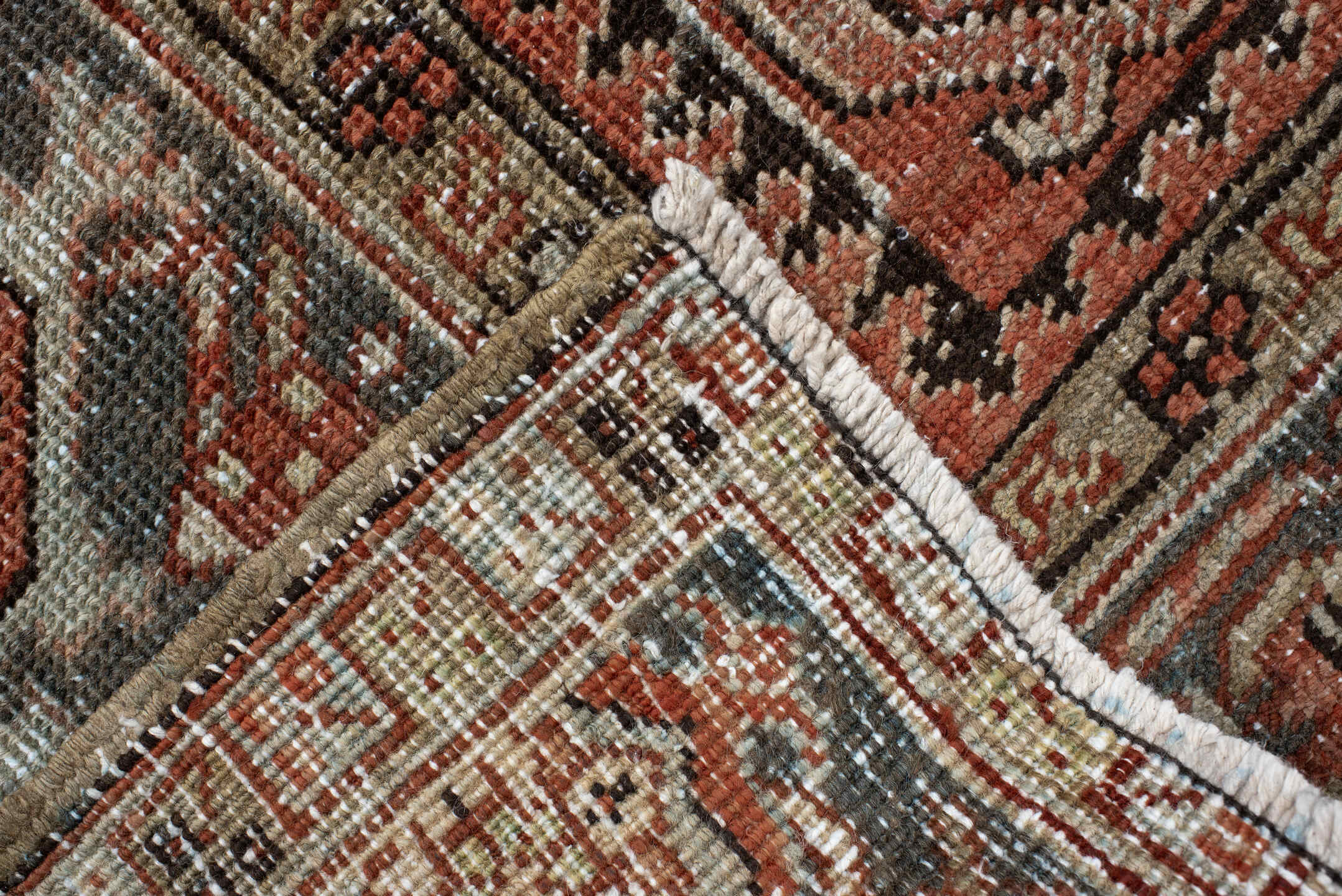 7' x 9' one-of-a-kind handmade antique Heriz large size rug. Color palette: terra cotta, ivory, slate, charcoal, rust, camel