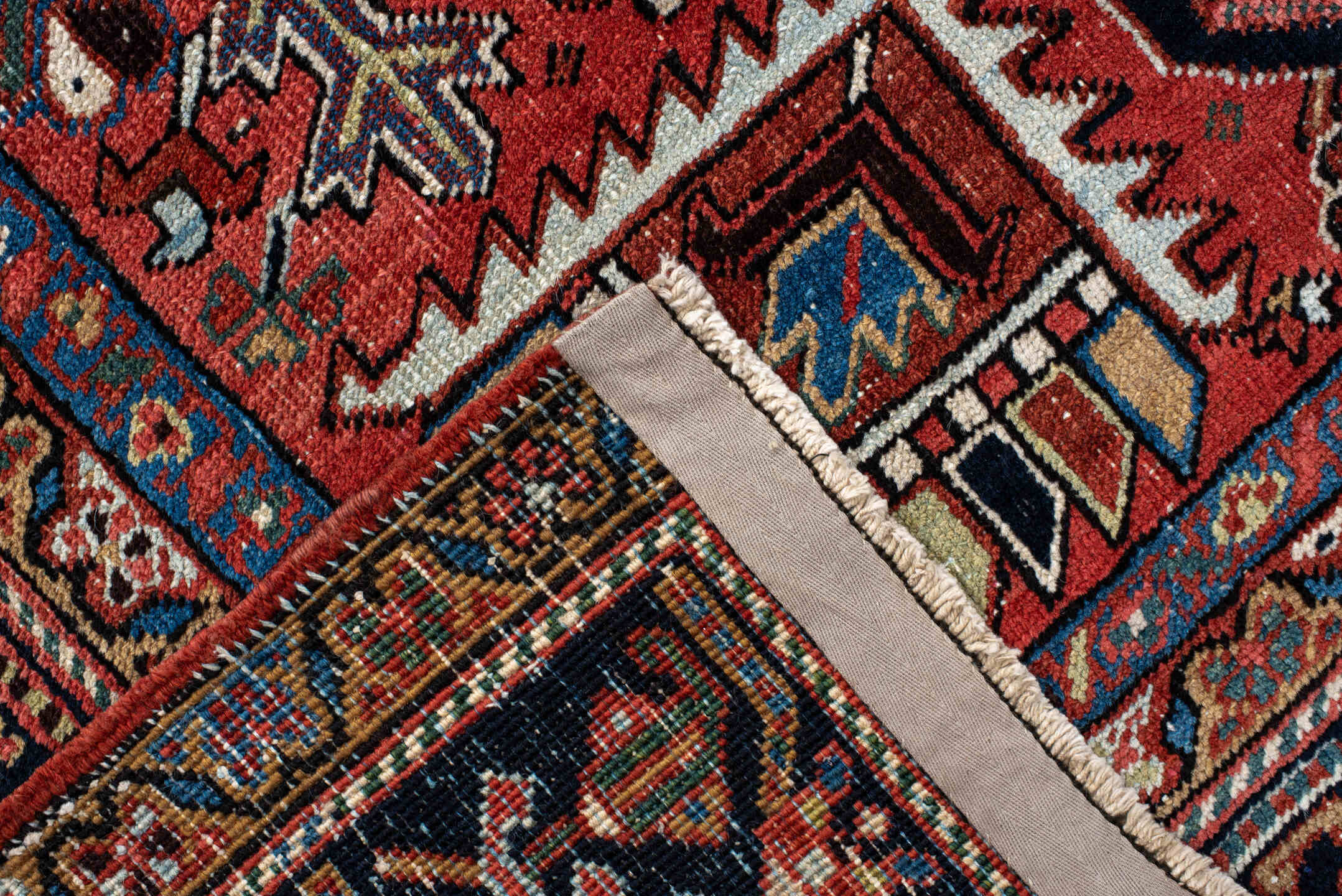 8' x 10' one-of-a-kind handmade antique  large size rug. Color palette: rust, navy, ivory, sky_blue, camel, slate, rose
