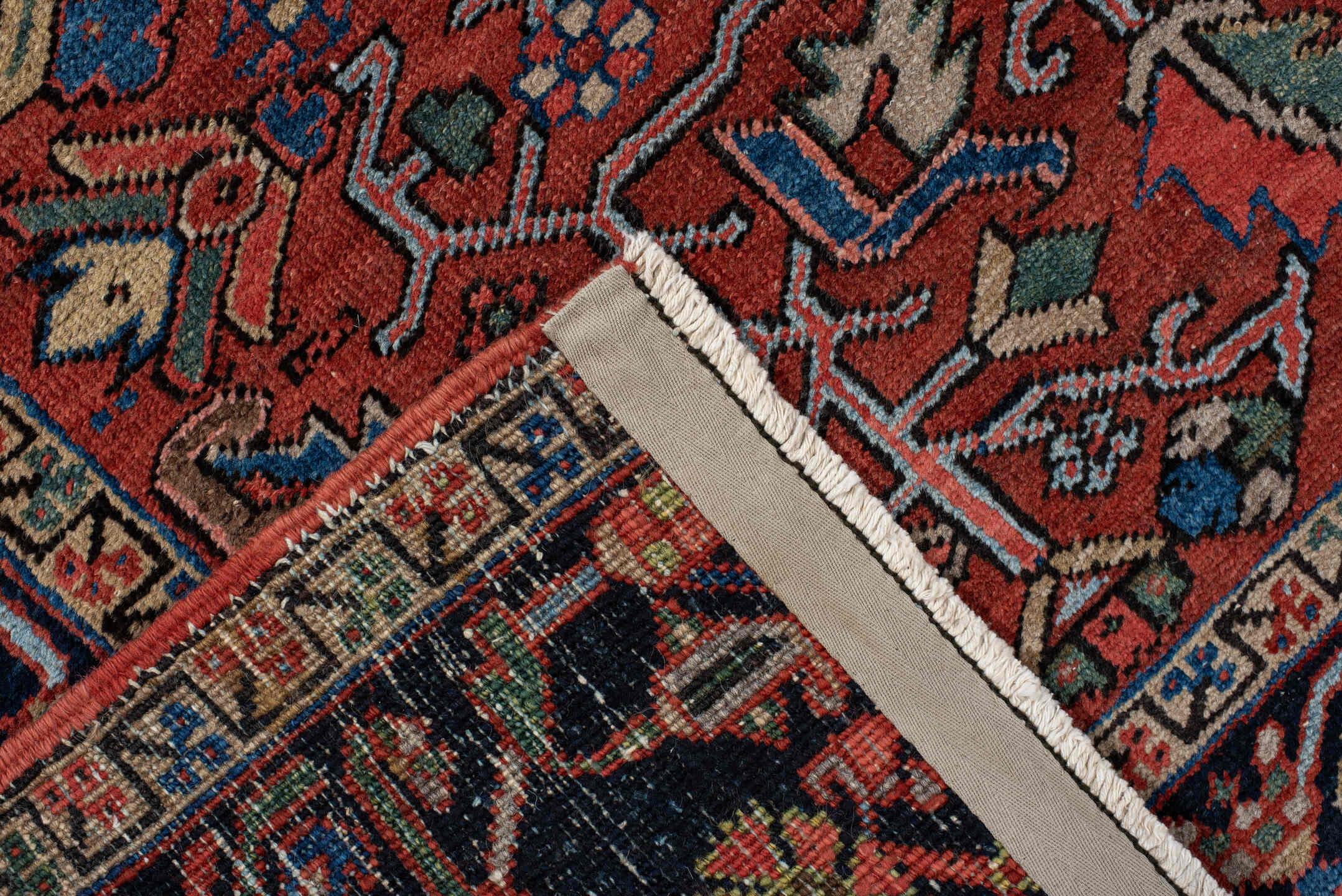 6' x 10' one-of-a-kind handmade antique Heriz large size rug. Color palette: rust, navy, ivory, sky_blue, sage, coral, camel
