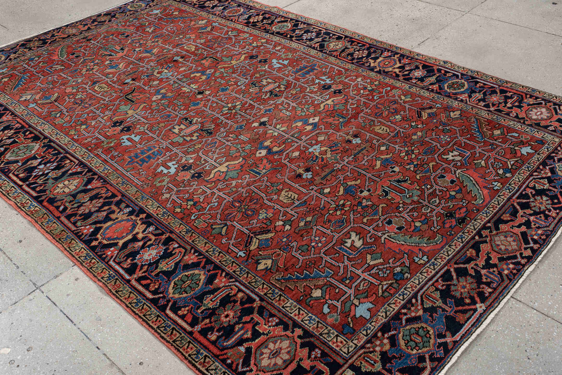 6' x 10' one-of-a-kind handmade antique Heriz large size rug. Color palette: rust, navy, ivory, sky_blue, sage, coral, camel