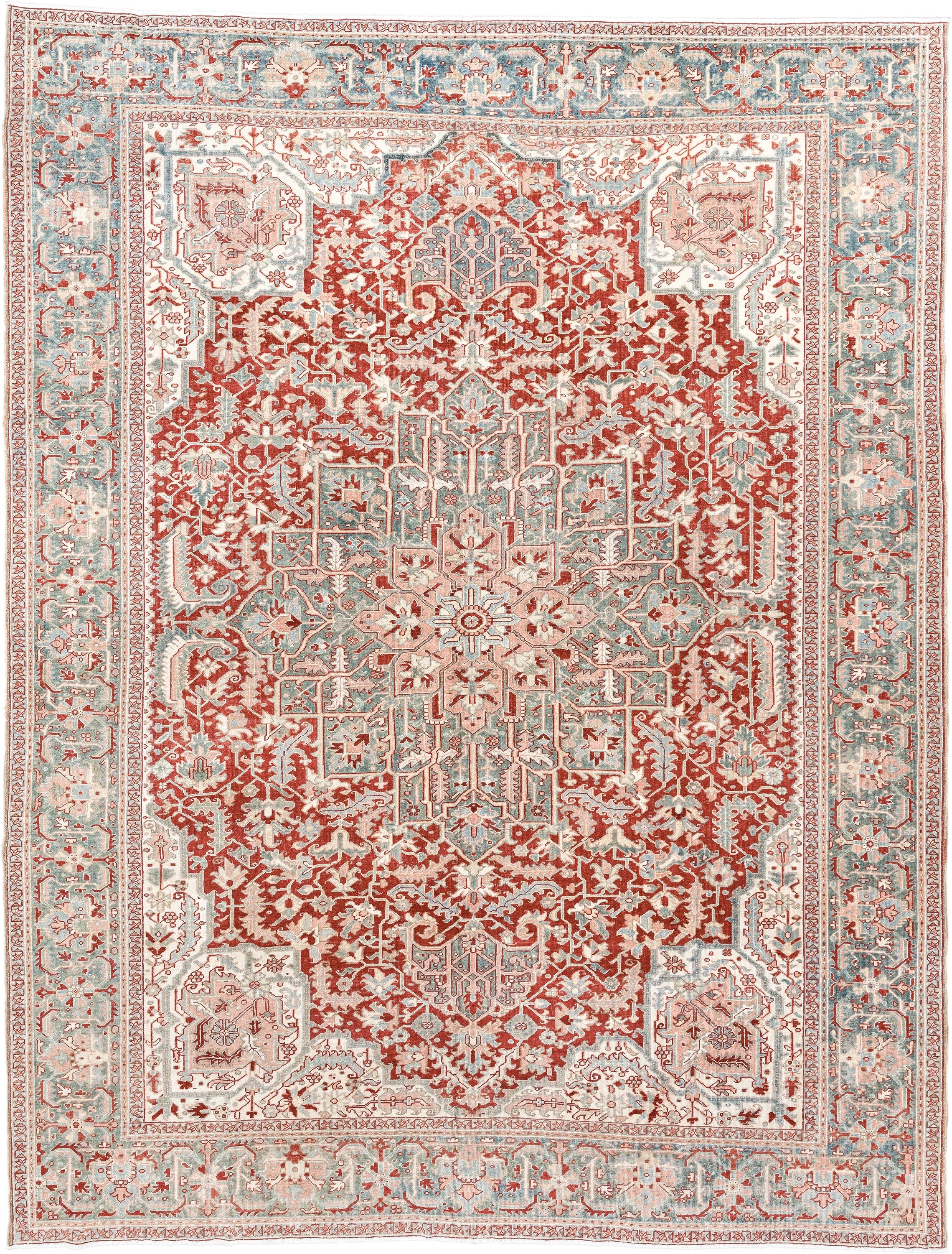 9' x 12' one-of-a-kind handmade antique Heriz large size rug. Color palette: rust, sky blue, ivory, terra cotta, sage, cream