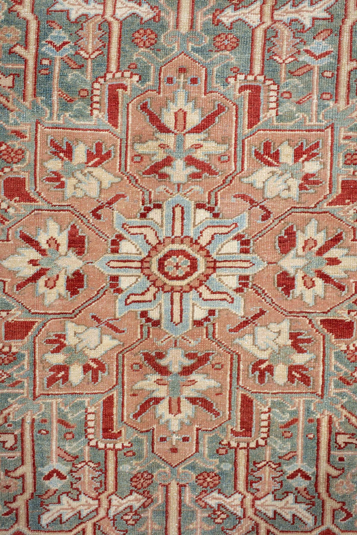 9' x 12' one-of-a-kind handmade antique Heriz large size rug. Color palette: rust, sky blue, ivory, terra cotta, sage, cream