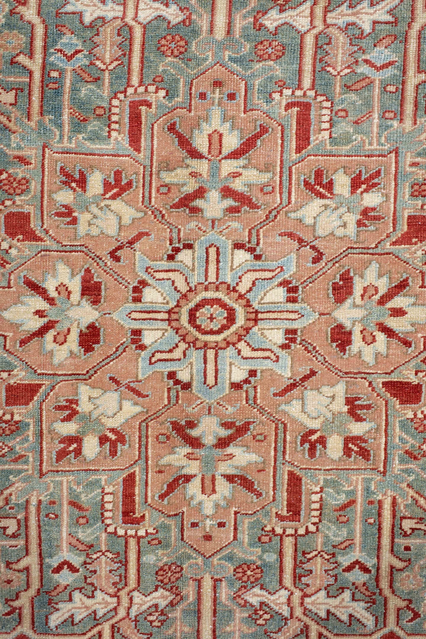 9' x 12' one-of-a-kind handmade antique Heriz large size rug. Color palette: rust, sky blue, ivory, terra cotta, sage, cream
