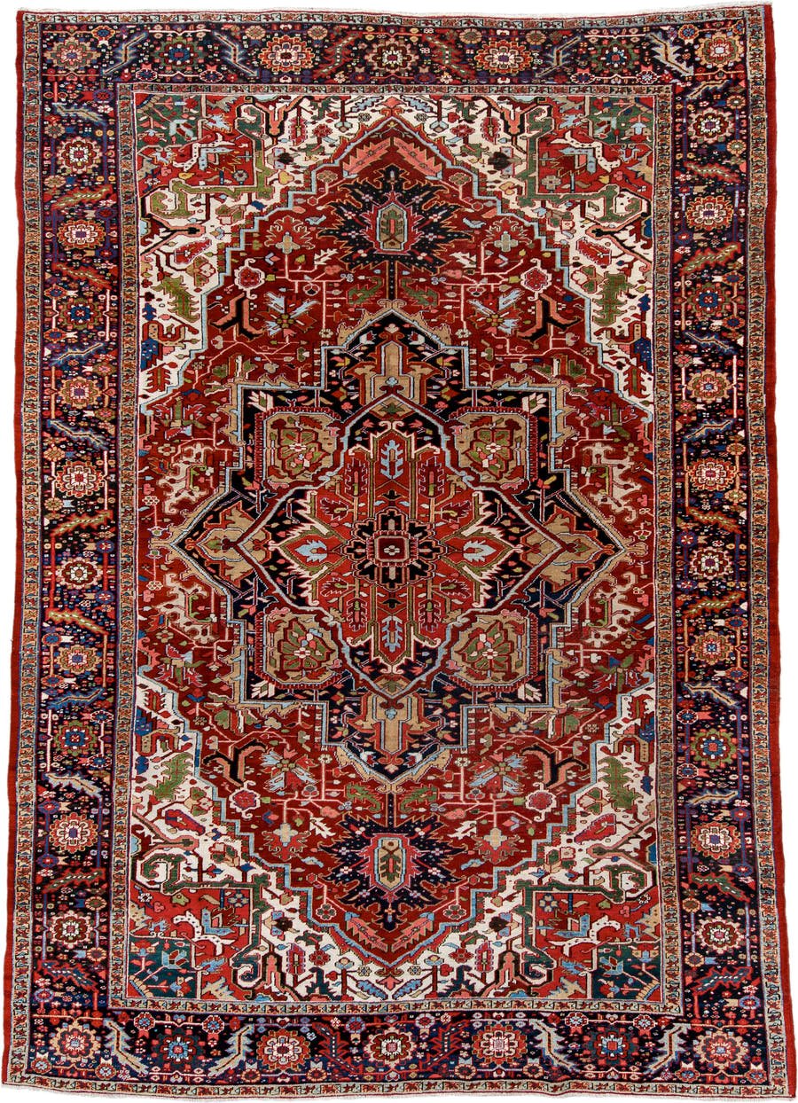 9' x 13' one-of-a-kind handmade antique Heriz large size rug. Color palette: rust, navy, ivory, brick, sage, sky blue, camel
