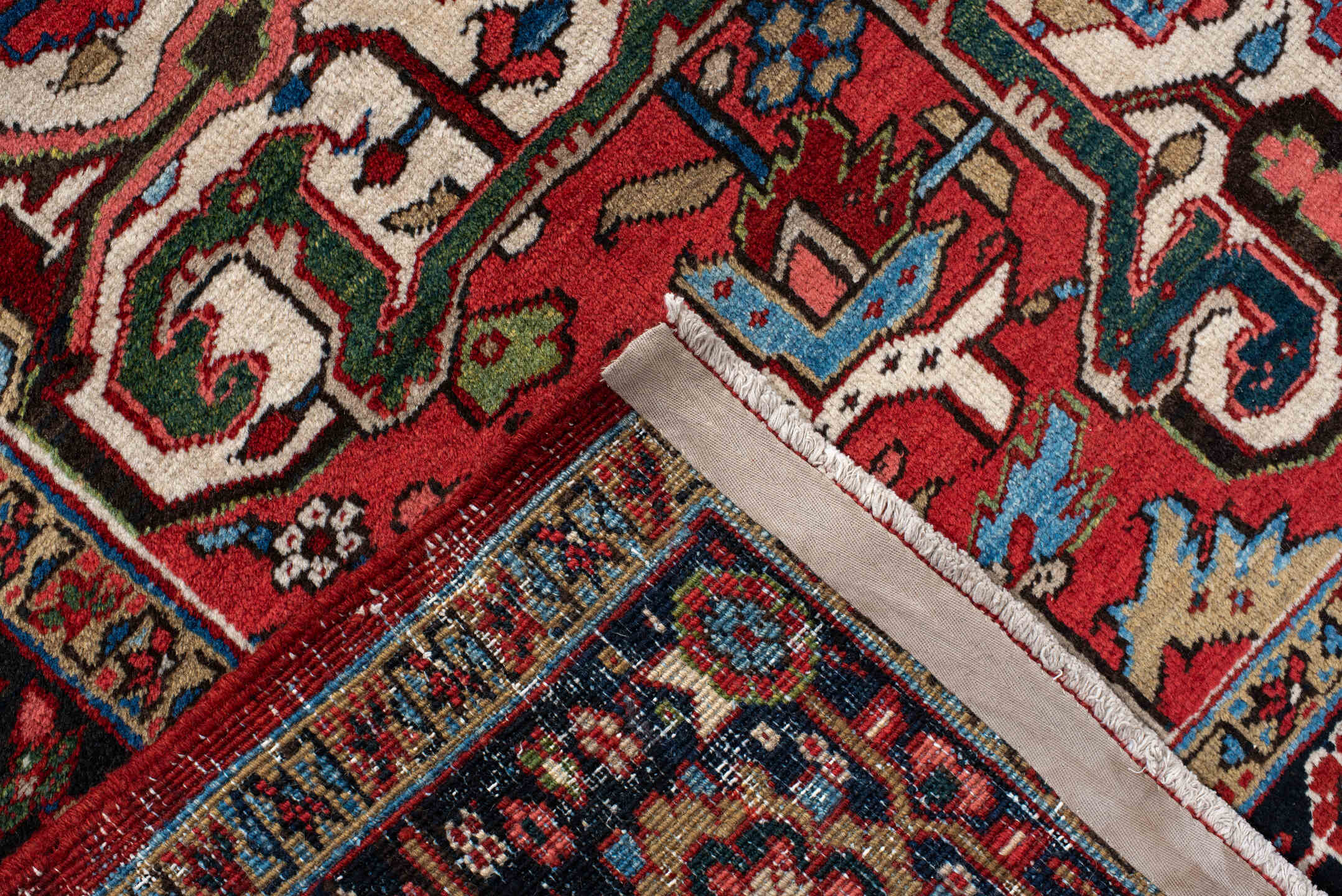 9' x 13' one-of-a-kind handmade antique Heriz large size rug. Color palette: rust, navy, ivory, brick, sage, sky blue, camel