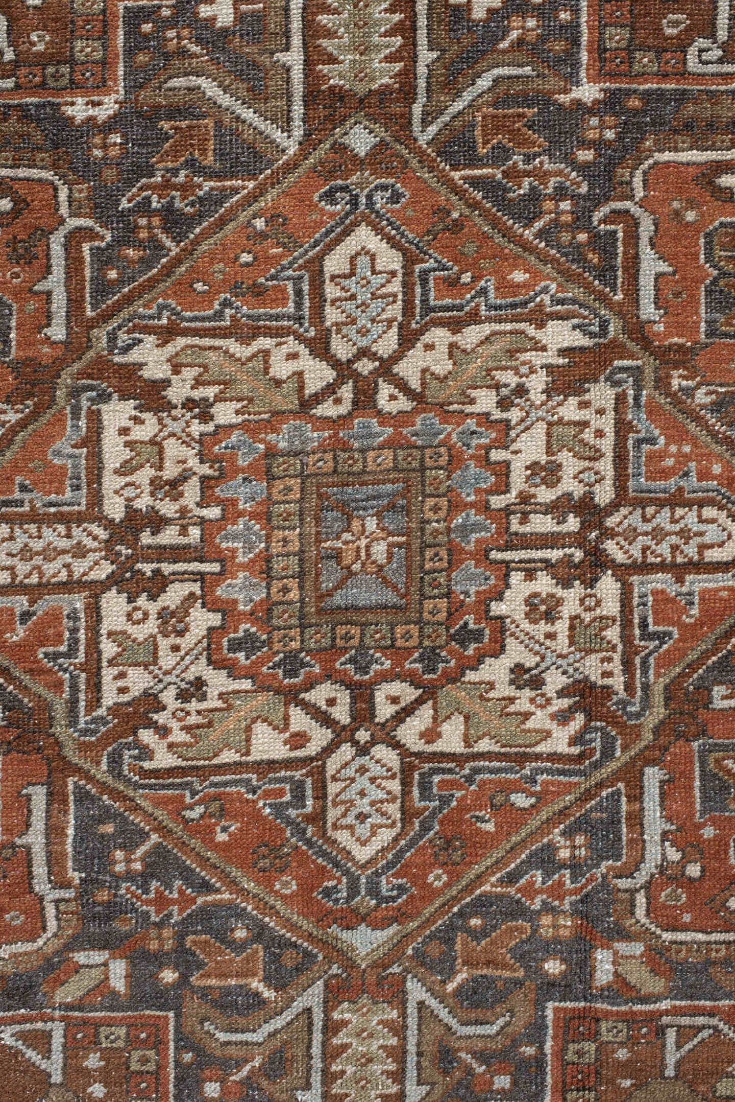 9' x 12' one-of-a-kind handmade antique Karaje large size rug. Color palette: rust, ivory, indigo, brown, terra cotta, slate