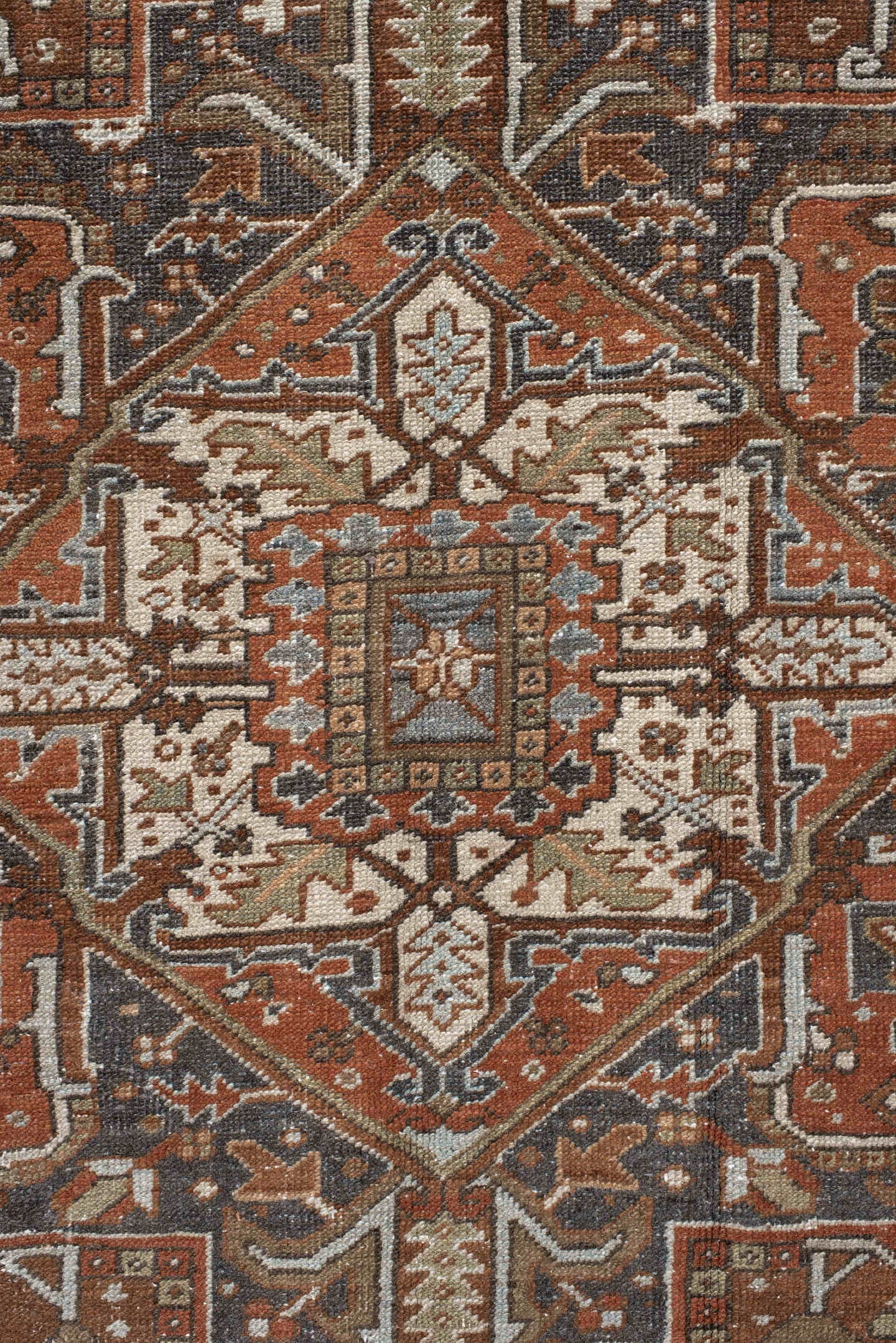 9' x 12' one-of-a-kind handmade antique Karaje large size rug. Color palette: rust, ivory, indigo, brown, terra cotta, slate