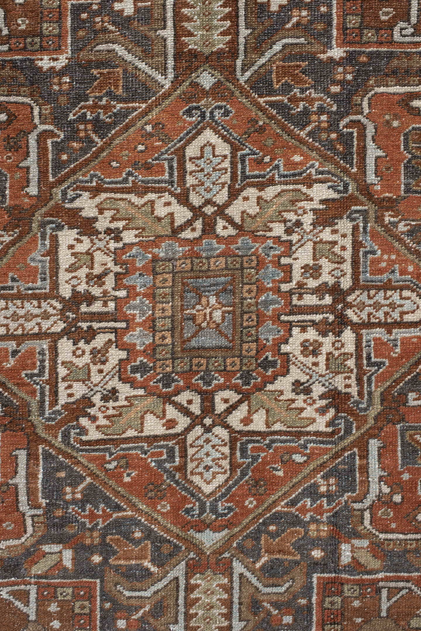 9' x 12' one-of-a-kind handmade antique Karaje large size rug. Color palette: rust, ivory, indigo, brown, terra cotta, slate