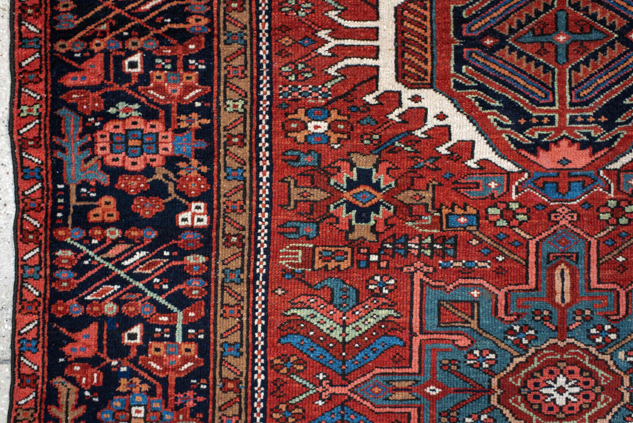 4' x 6' one-of-a-kind handmade vintage Karaje small size rug. Color palette: black, blue, brown, fire brick, gray, off-white