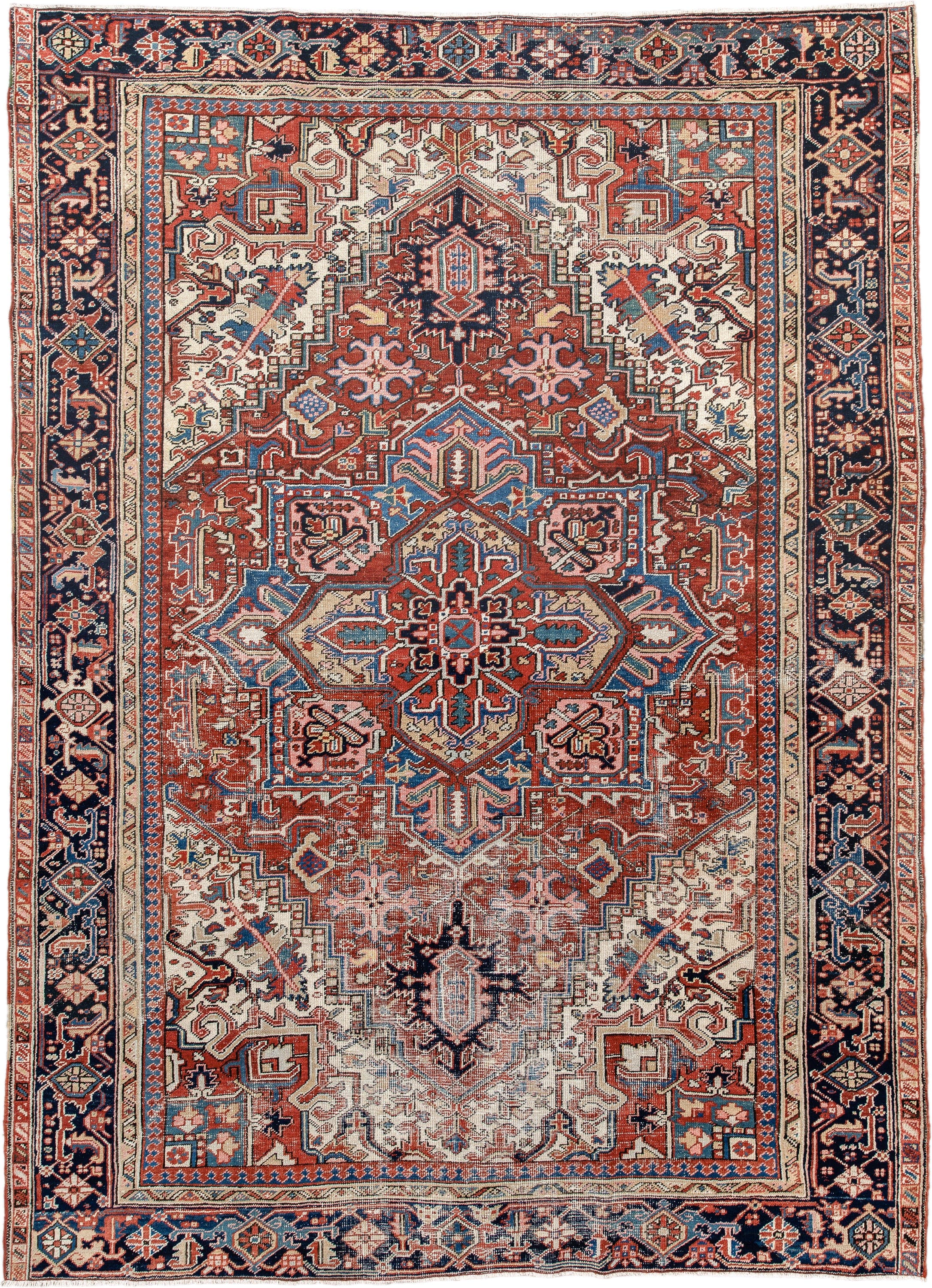 7' x 10' one-of-a-kind handmade antique Heriz large size rug. Color palette: rust, ivory, navy, sky_blue, brick, coral