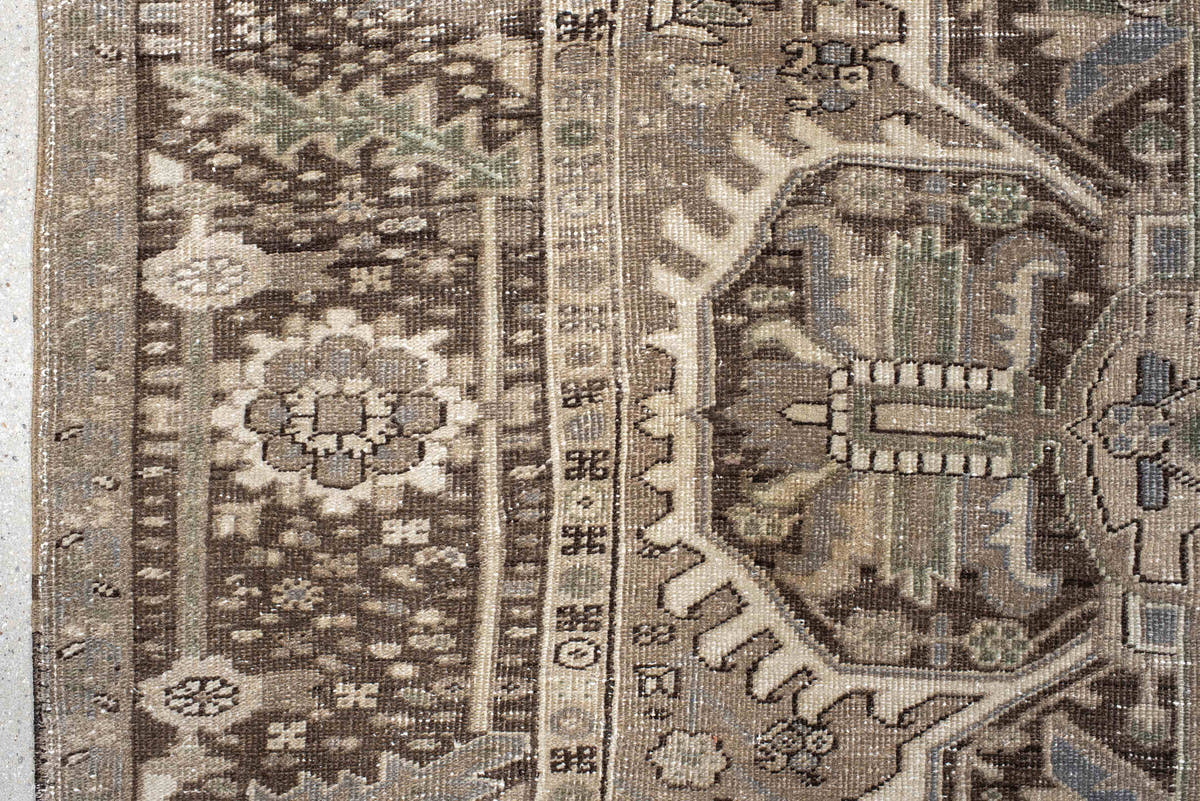 8' x 11' one-of-a-kind handmade antique Heriz large size rug. Color palette: taupe, brown, ivory, slate, sage, camel, beige
