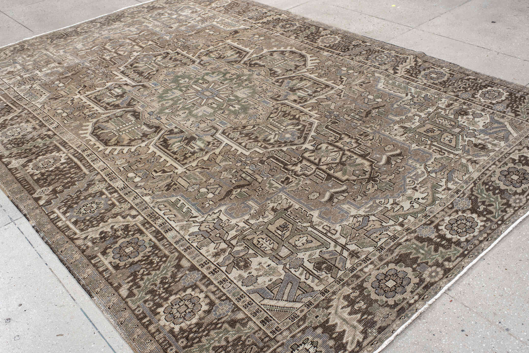 8' x 11' one-of-a-kind handmade antique Heriz large size rug. Color palette: taupe, brown, ivory, slate, sage, camel, beige