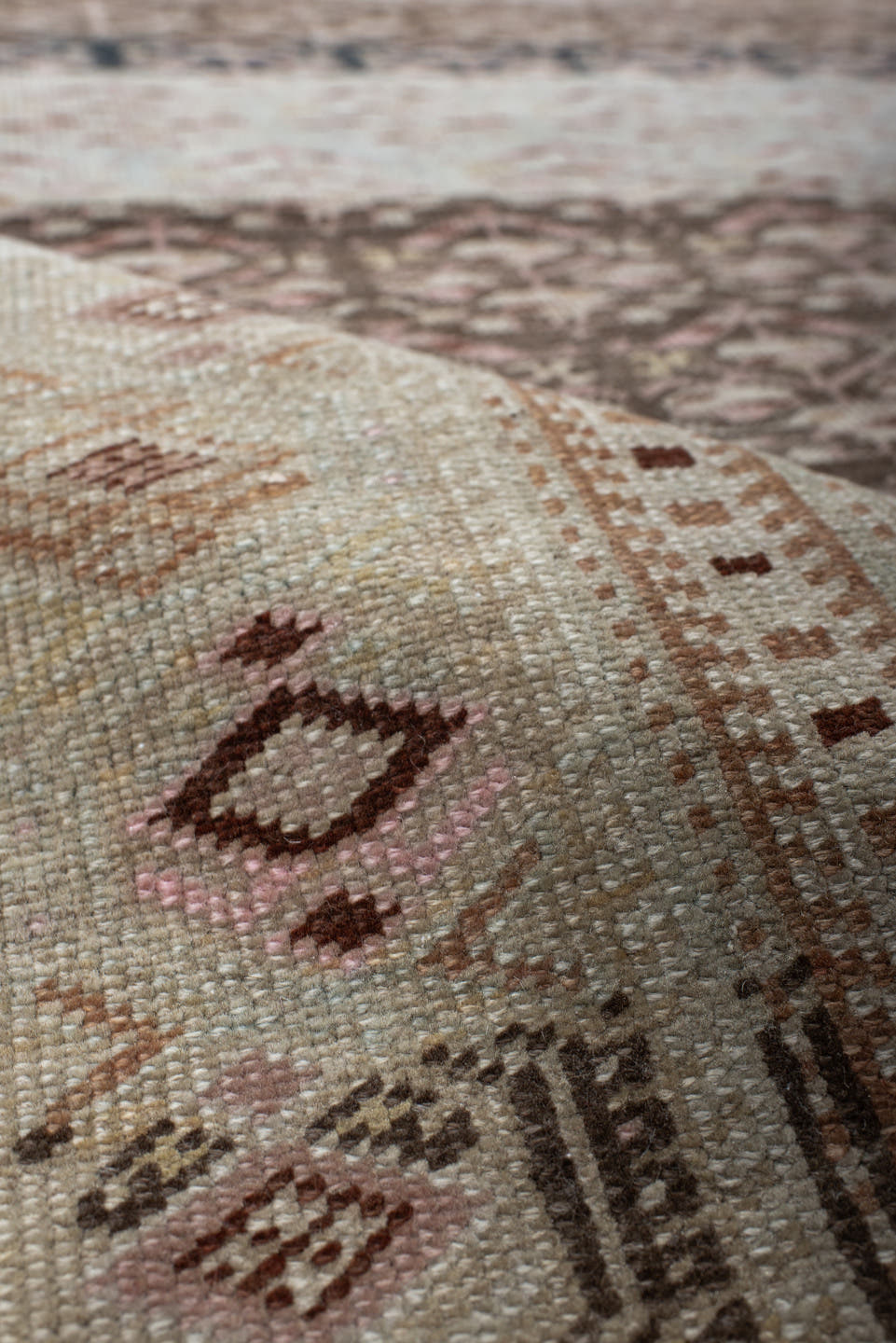 5' x 10' one-of-a-kind handmade antique NW Persian medium size rug. Color palette: ivory, brown, sky blue, taupe, rose, rust