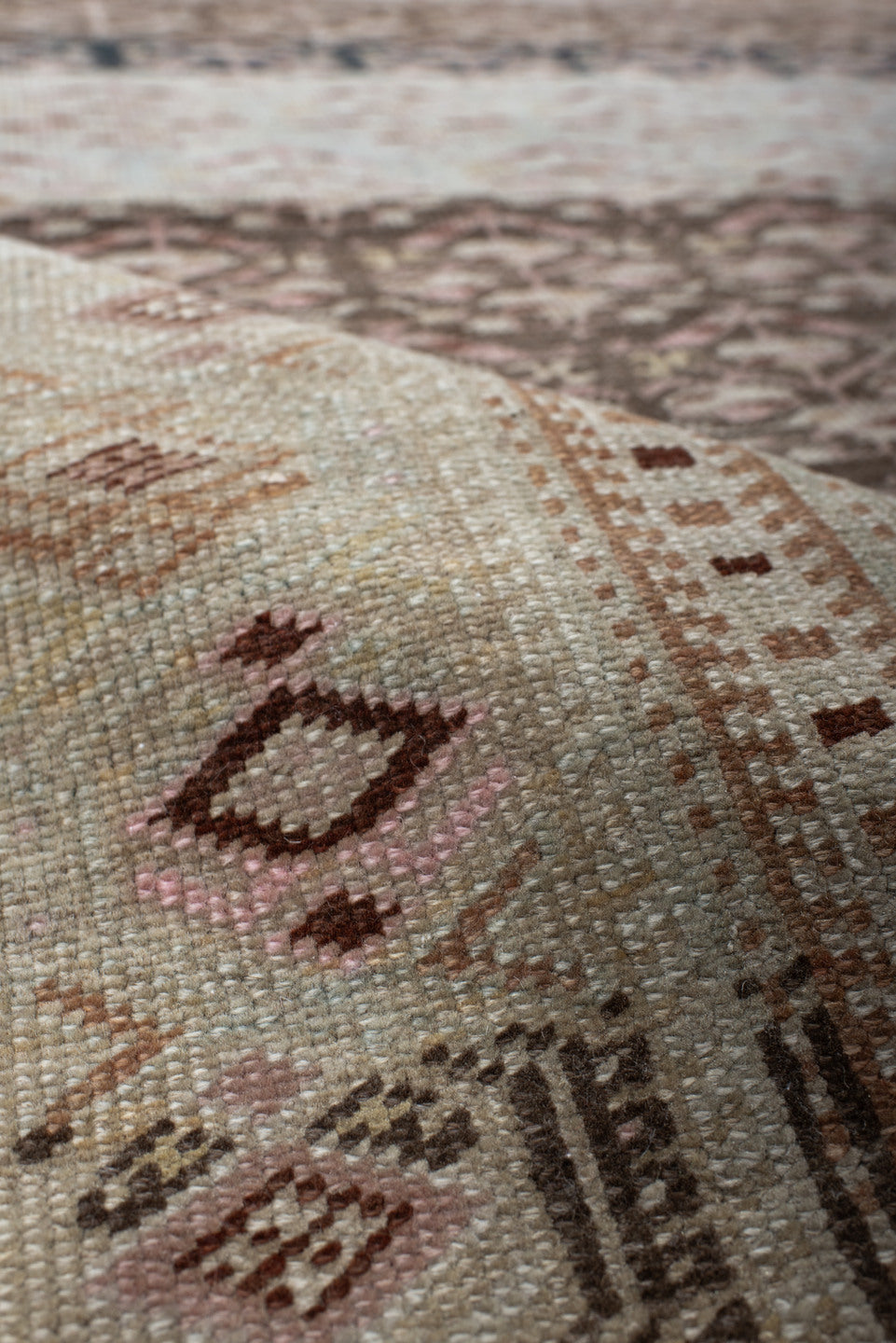 5' x 10' one-of-a-kind handmade antique NW Persian medium size rug. Color palette: ivory, brown, sky blue, taupe, rose, rust