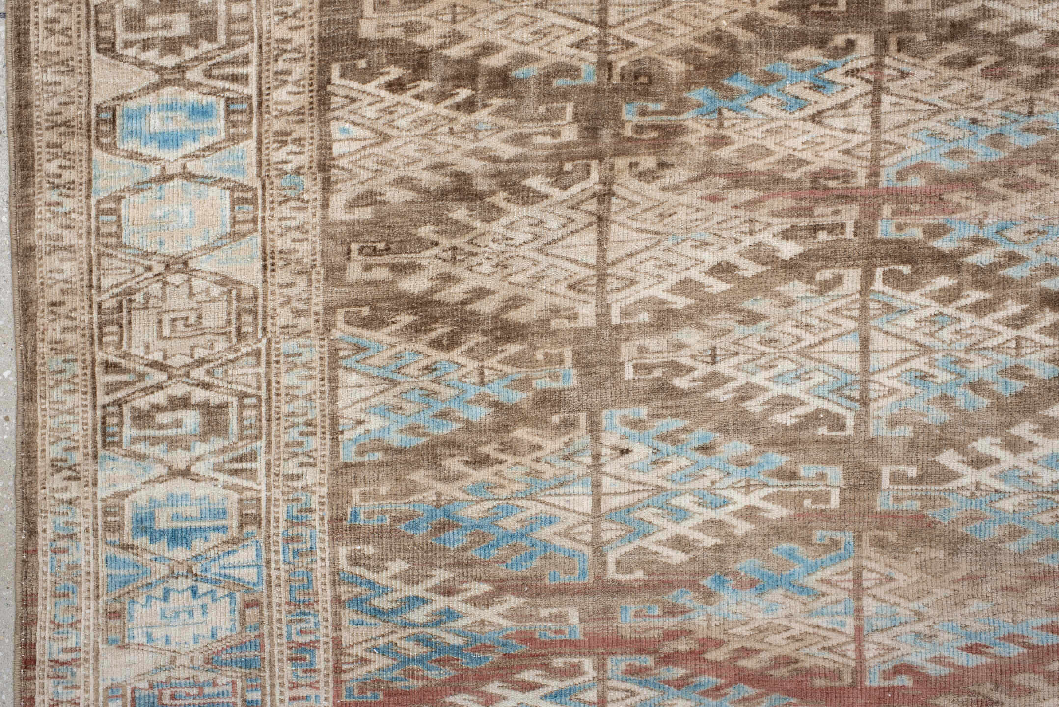 6' x 9' one-of-a-kind handmade antique Yamoud medium size rug. Color palette: ivory, taupe, camel, sky blue, brown, rose