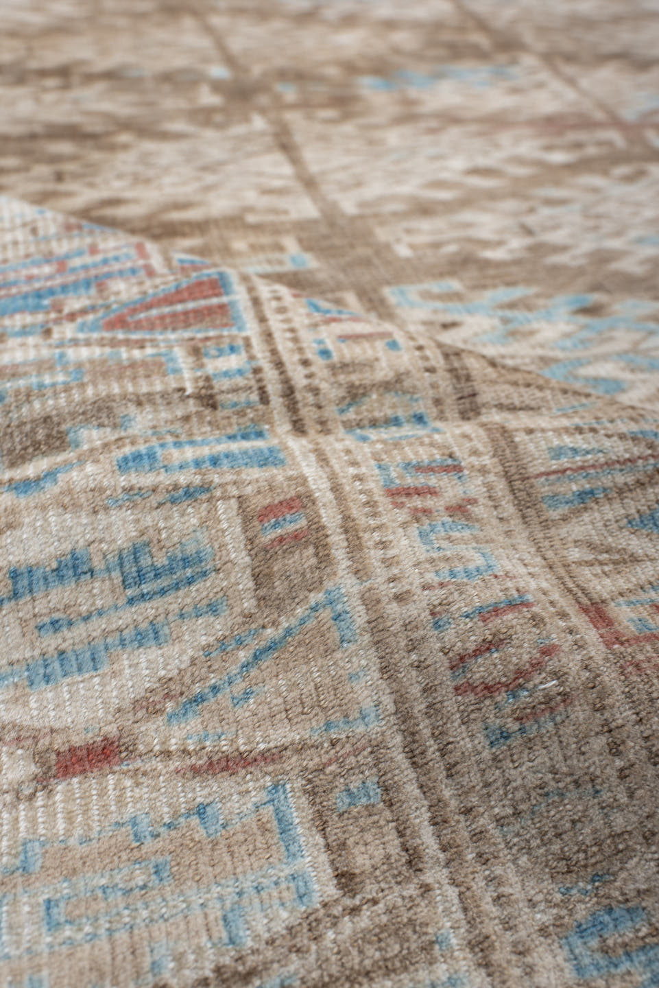 6' x 9' one-of-a-kind handmade antique Yamoud medium size rug. Color palette: ivory, taupe, camel, sky blue, brown, rose