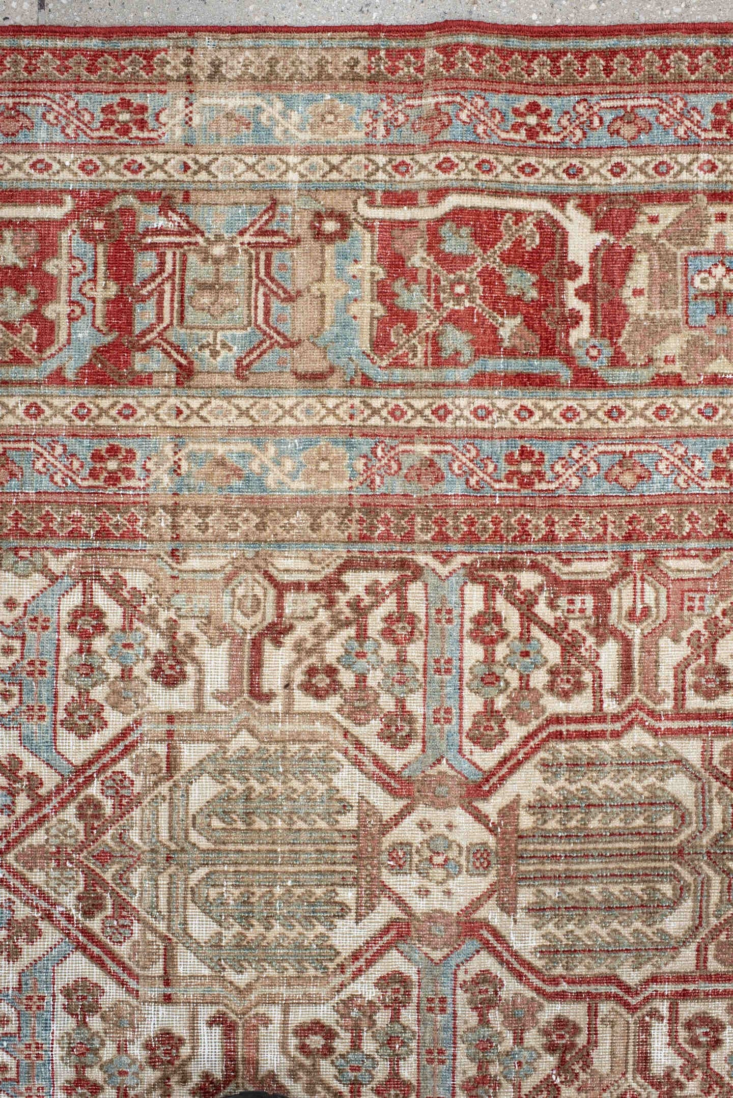 7' x 10' one-of-a-kind handmade antique Joshegan large size rug. Color palette: ivory, rust, sky_blue, camel, brick, taupe