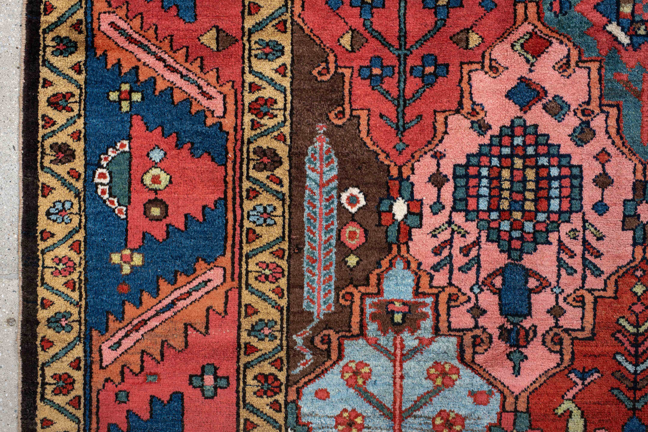 6' x 10' one-of-a-kind handmade antique Baktiary large size rug. Color palette: rust, indigo, rose, ivory, sky blue, navy