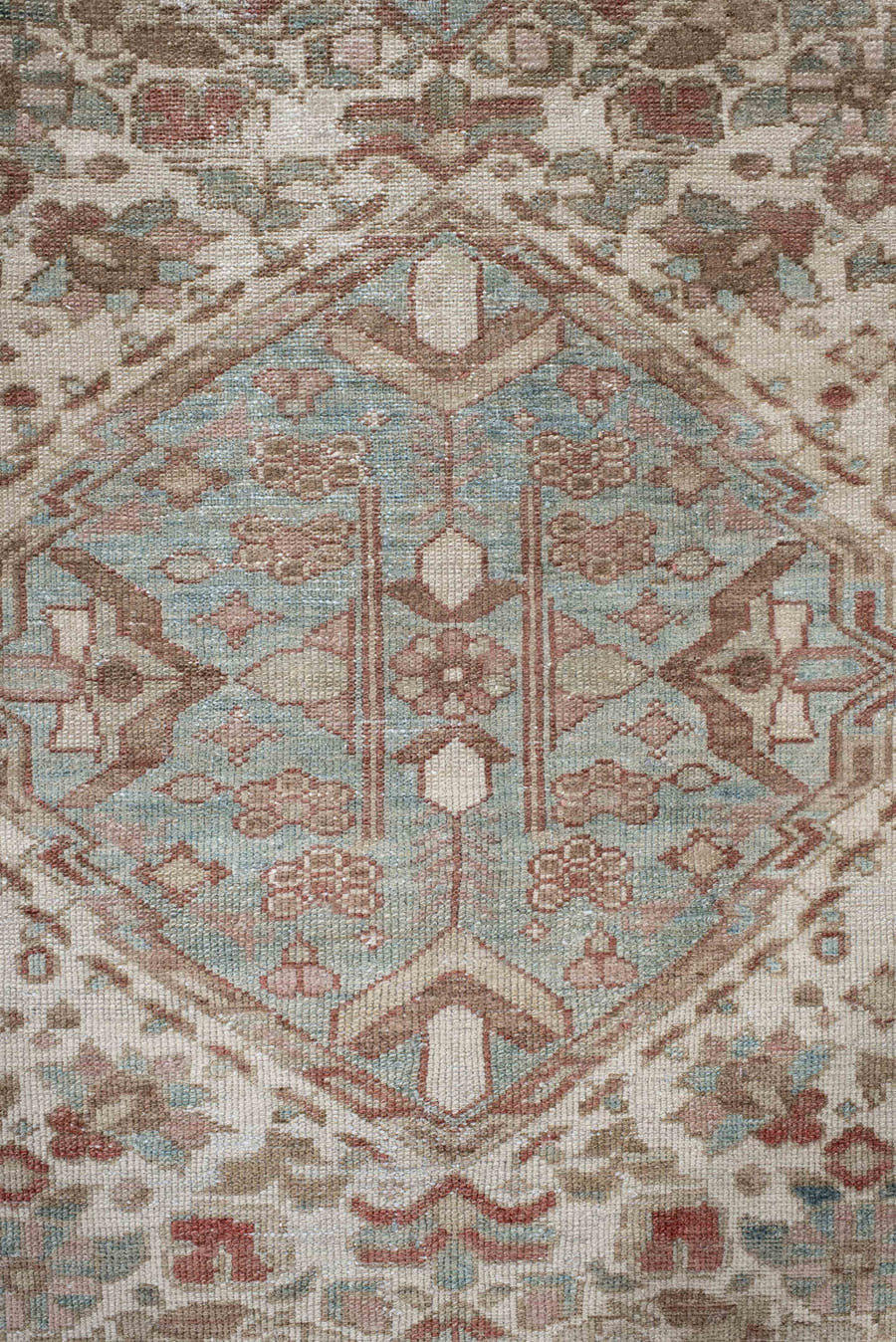 6' x 10' one-of-a-kind handmade antique Baktiary large size rug. Color palette: ivory, dusty blue, rose, taupe, terra cotta
